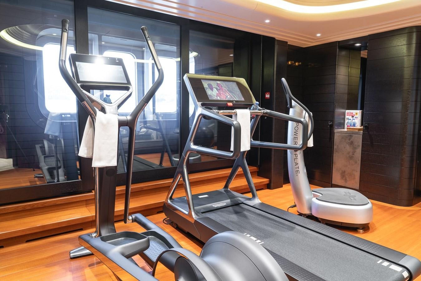 treadmills in a gym aboard WHISPER Yacht for Sale