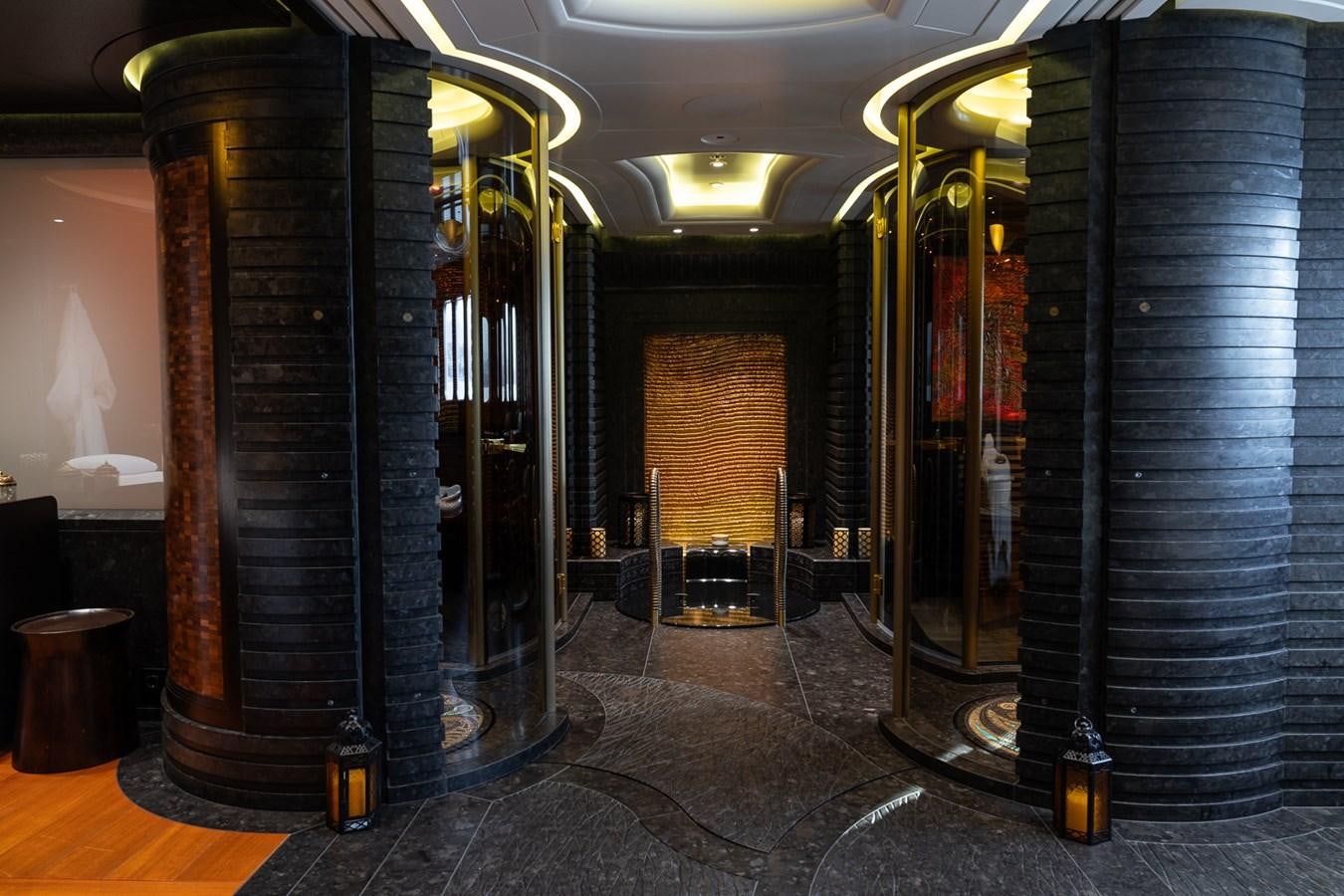 a room with a large glass display case and a large black door aboard WHISPER Yacht for Sale