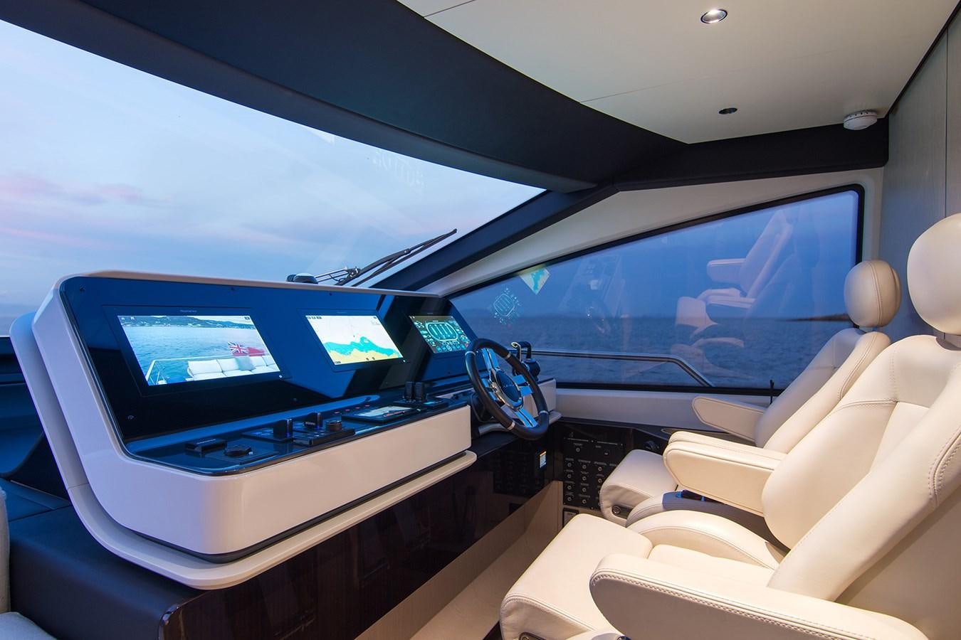 a car with a screen and a computer on it aboard GDL Yacht for Sale