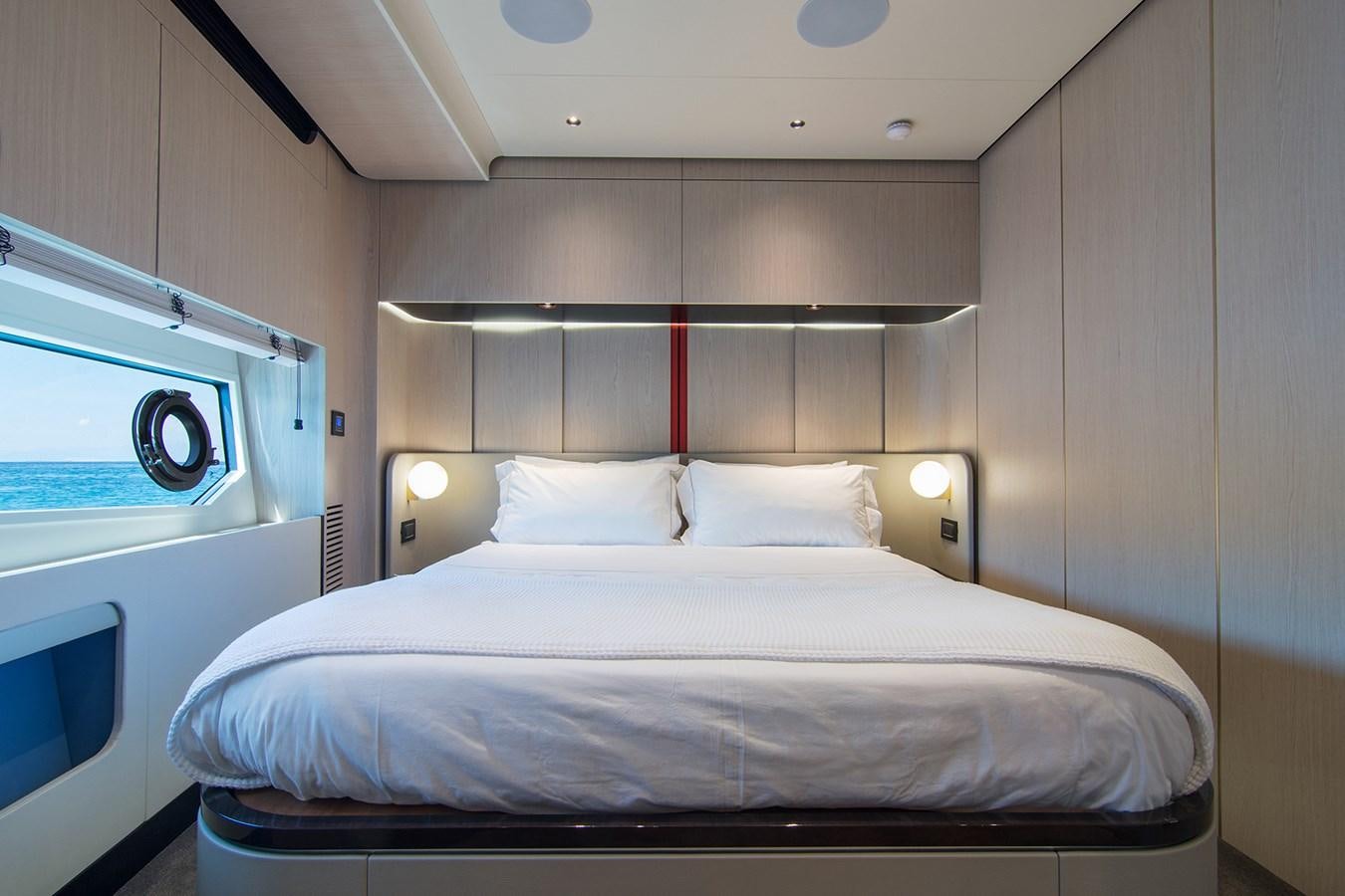 a bed with a white sheet aboard GDL Yacht for Sale