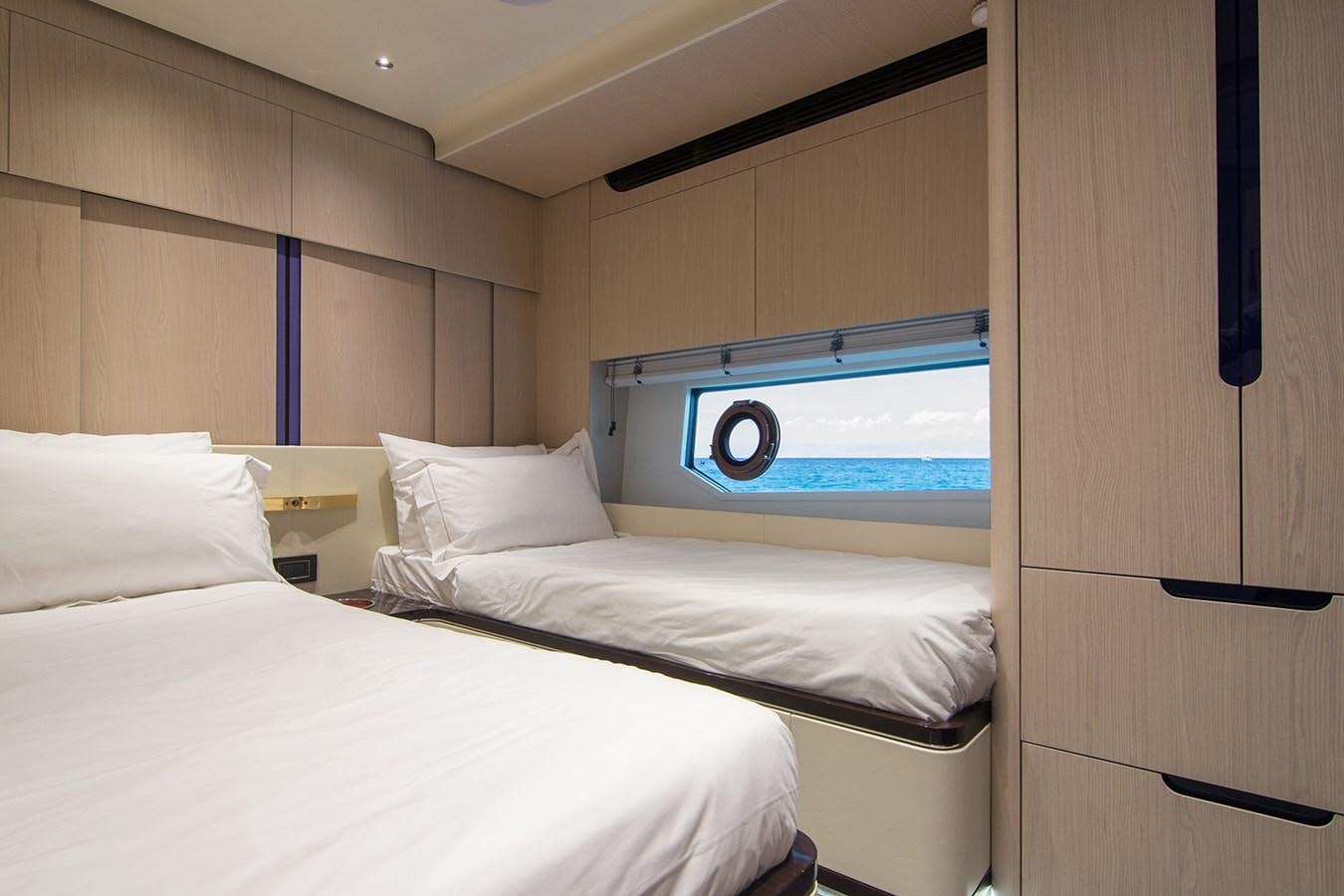 a room with two beds aboard GDL Yacht for Sale