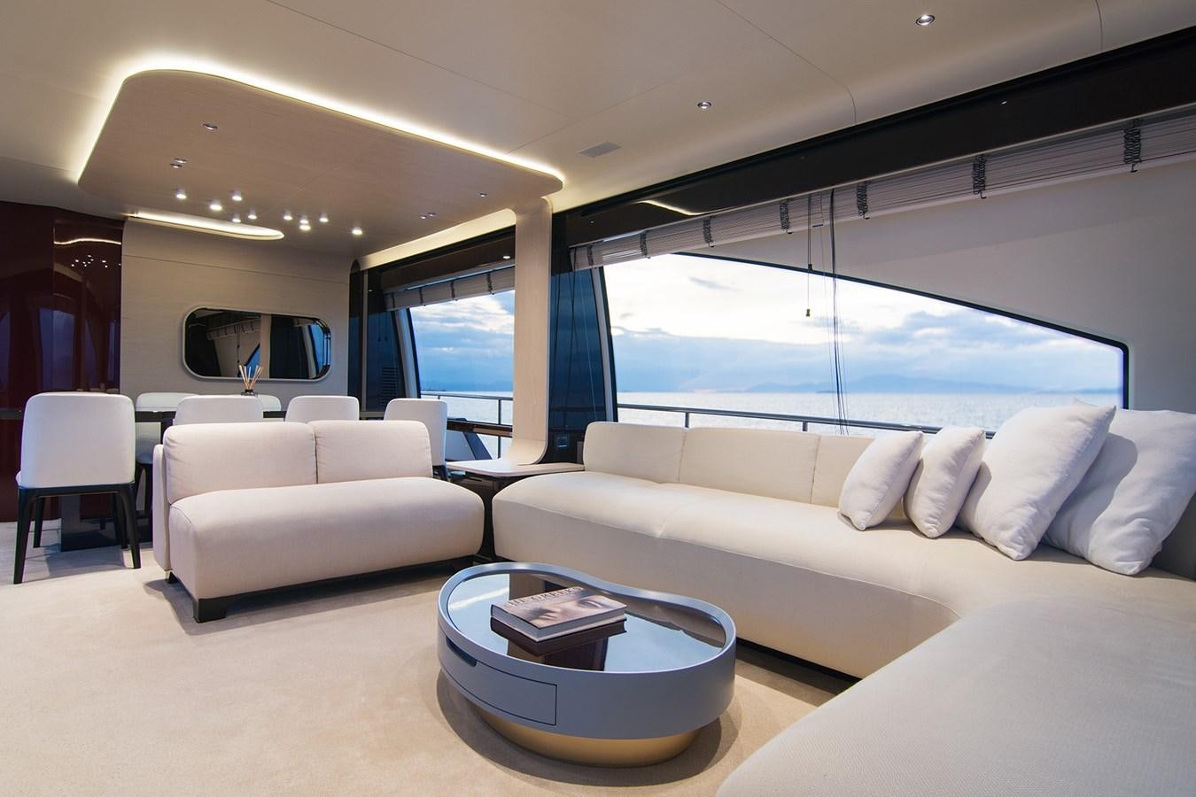 a room with a couch and a table aboard GDL Yacht for Sale