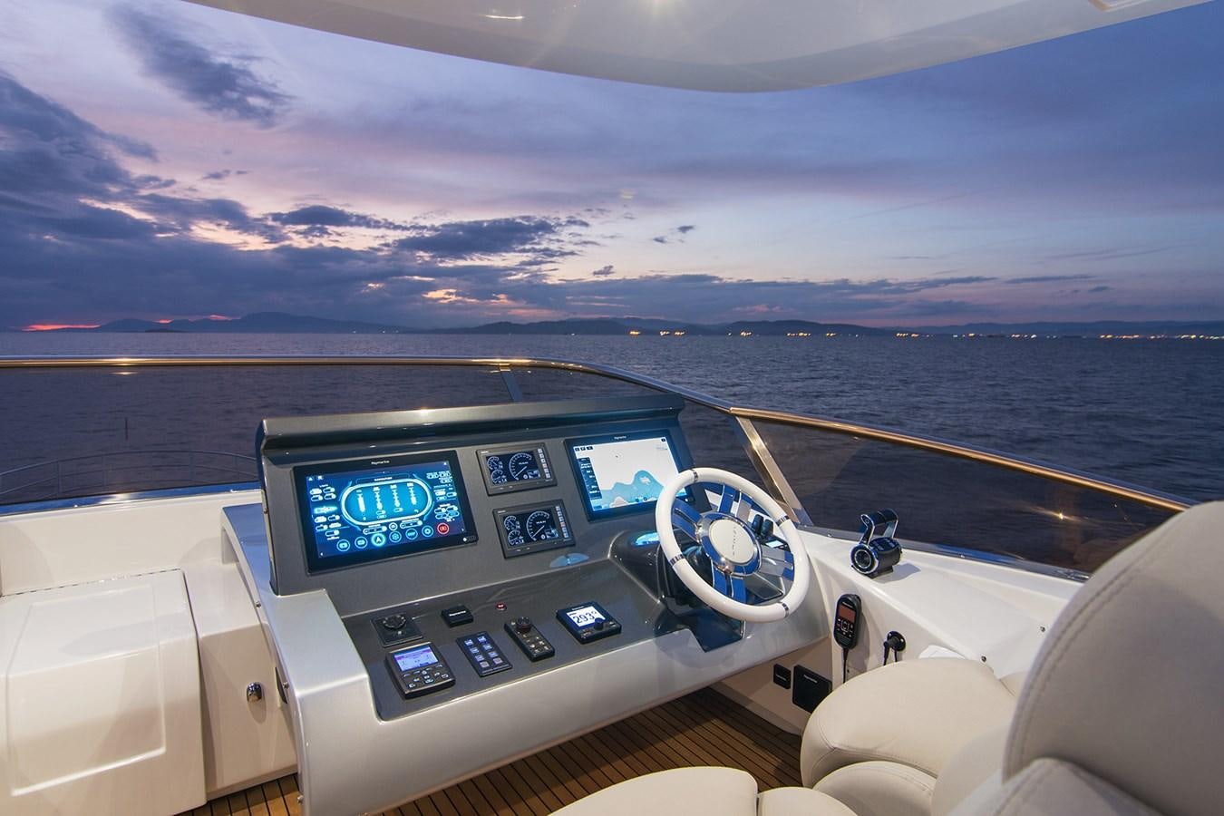 a view of a sunset over a city from a plane aboard GDL Yacht for Sale