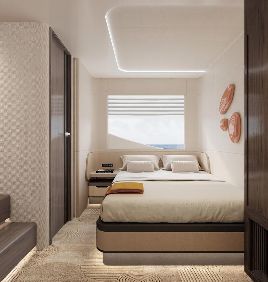 a bedroom with a bed and a window aboard AQUITALIA 68 Yacht for Sale