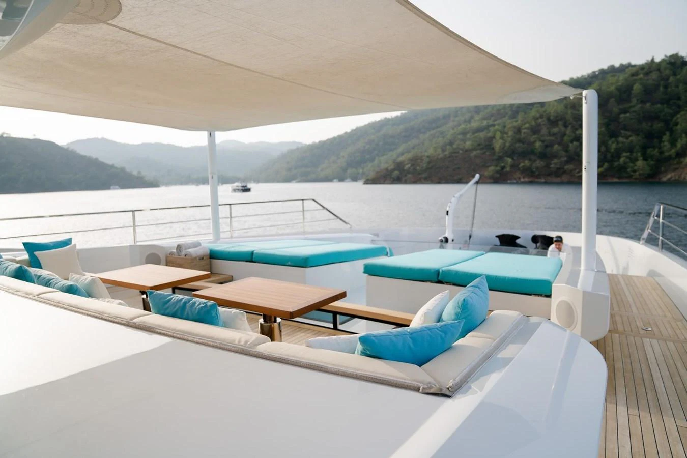 a pool with a deck and a boat on it aboard UNASOLA Yacht for Sale