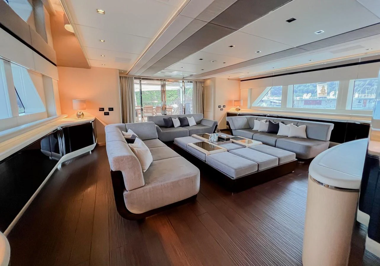 a living room with a large window aboard UNASOLA Yacht for Sale