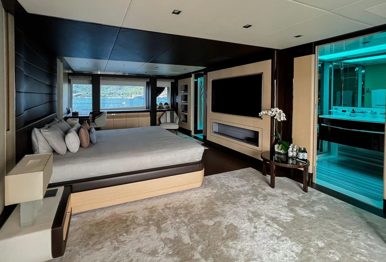 a bedroom with a large bed aboard UNASOLA Yacht for Sale
