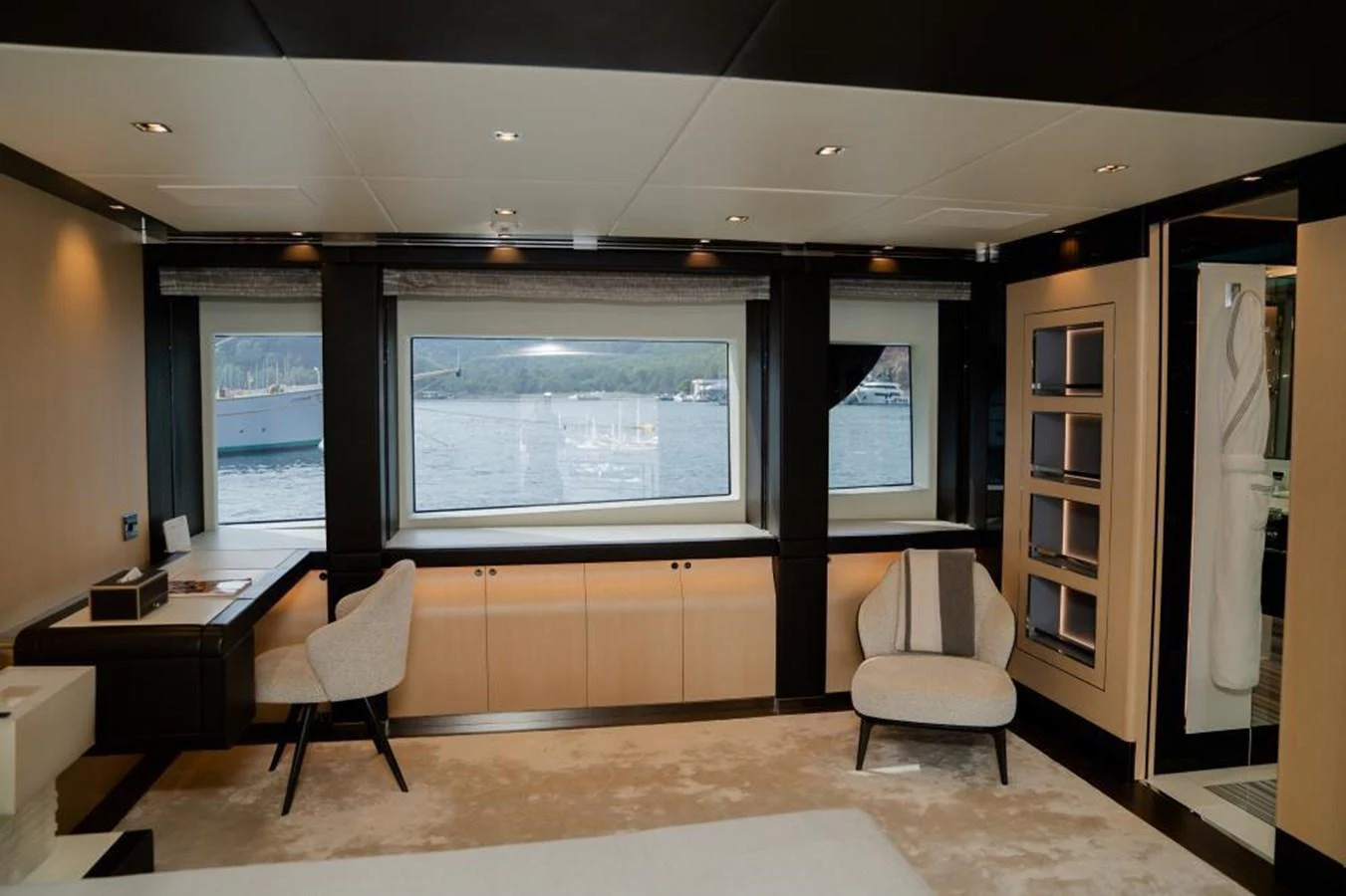 a room with a large screen aboard UNASOLA Yacht for Sale