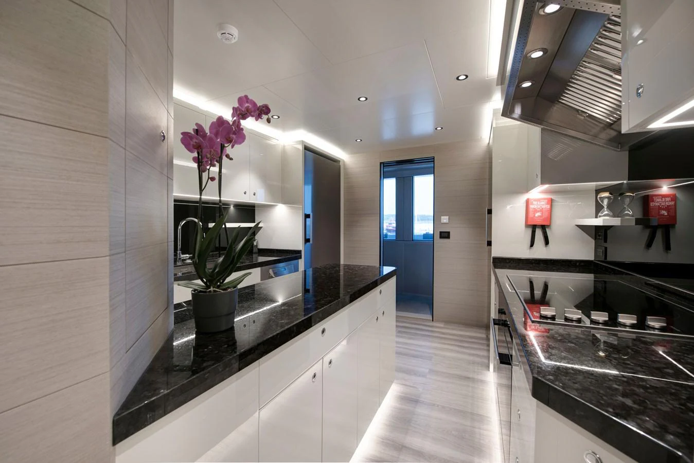 a kitchen with a countertop aboard PICCOLO @ FLIBS Yacht for Sale