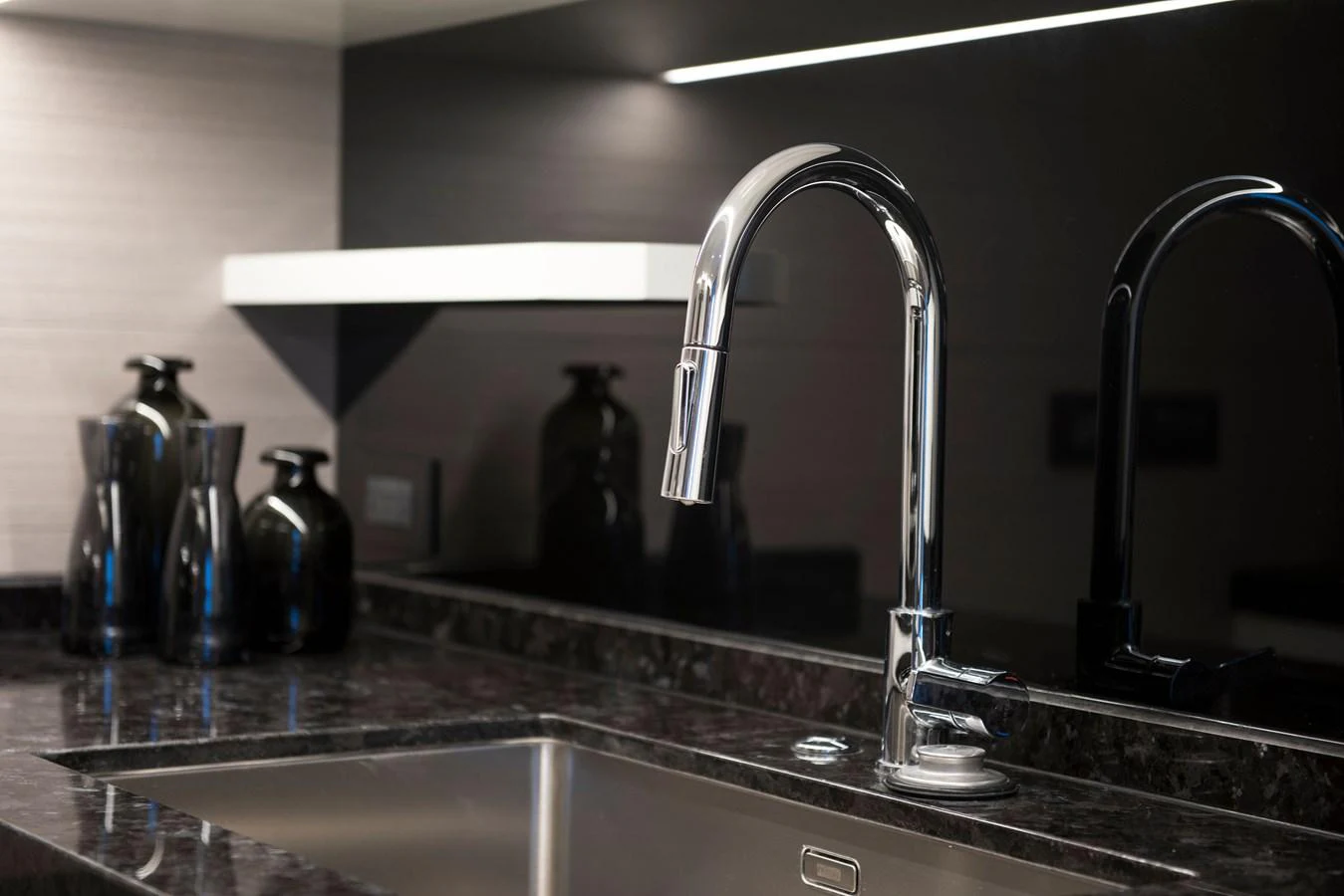 a kitchen sink with a faucet aboard PICCOLO @ FLIBS Yacht for Sale