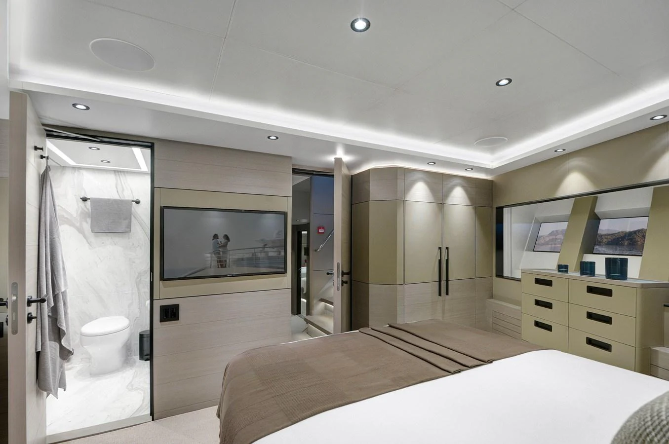 a bathroom with a large mirror aboard PICCOLO @ FLIBS Yacht for Sale
