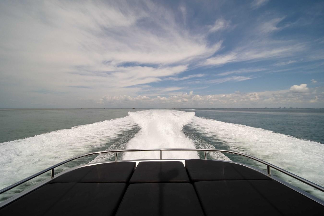 a large white sand beach aboard ARENA Yacht for Sale