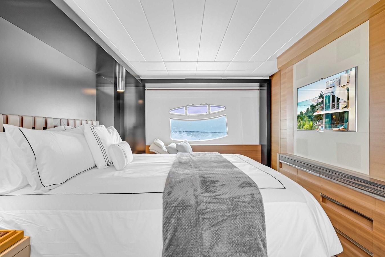 a room with two beds aboard ARENA Yacht for Sale