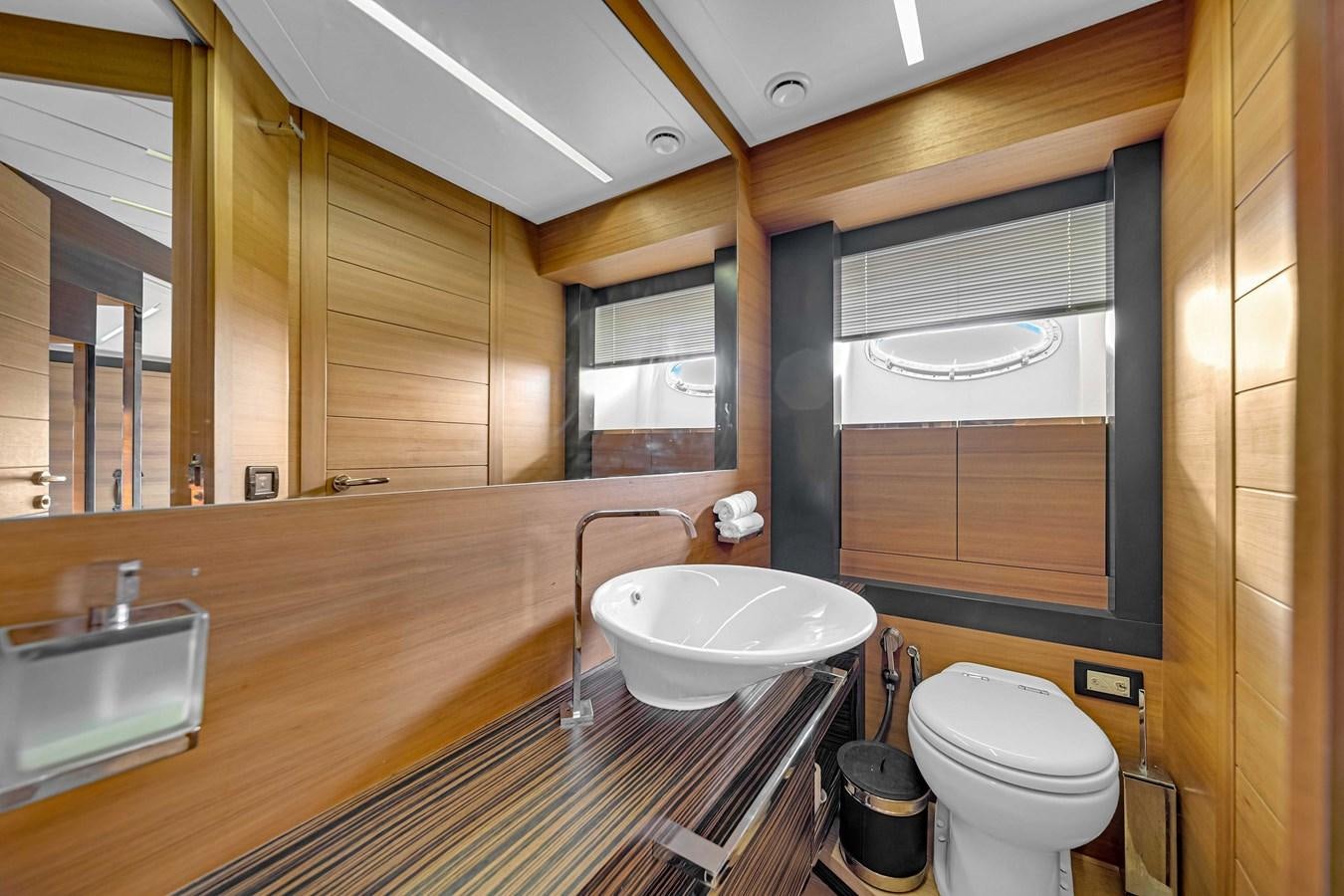a bathroom with a sink and a toilet aboard ARENA Yacht for Sale