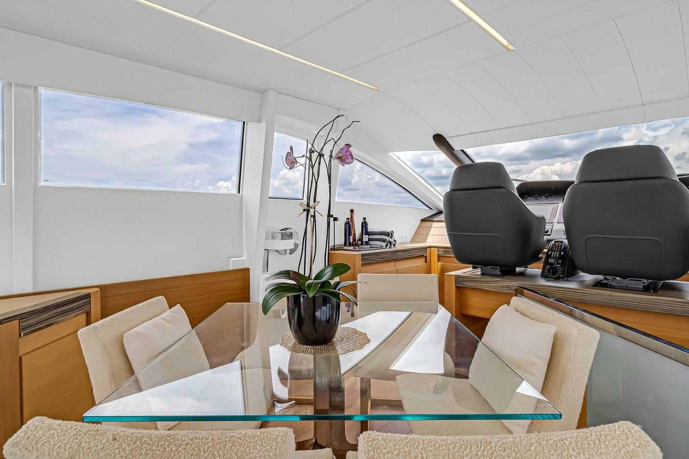 a room with a desk and a television aboard ARENA Yacht for Sale