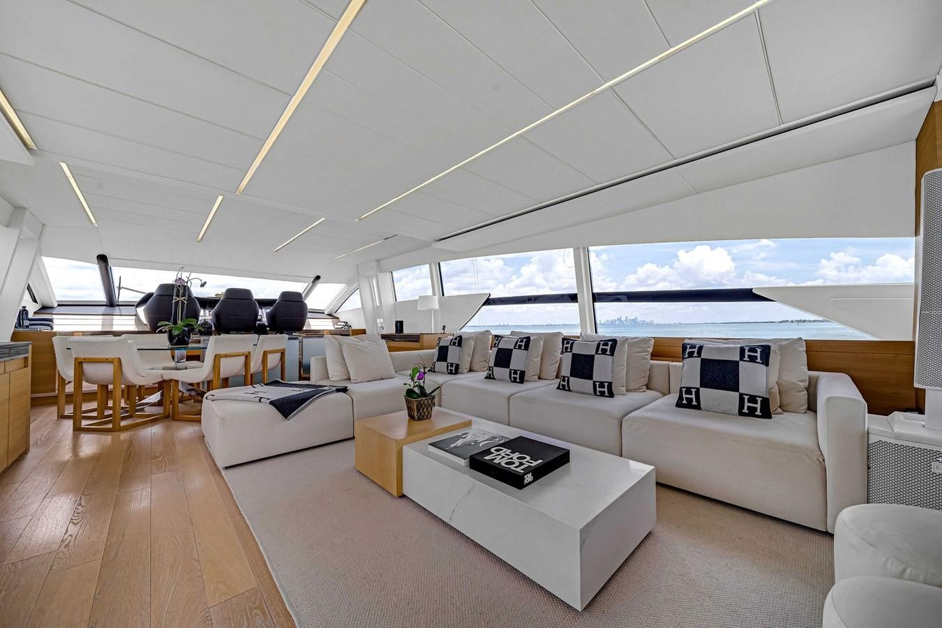 a room with a couch and a table aboard ARENA Yacht for Sale