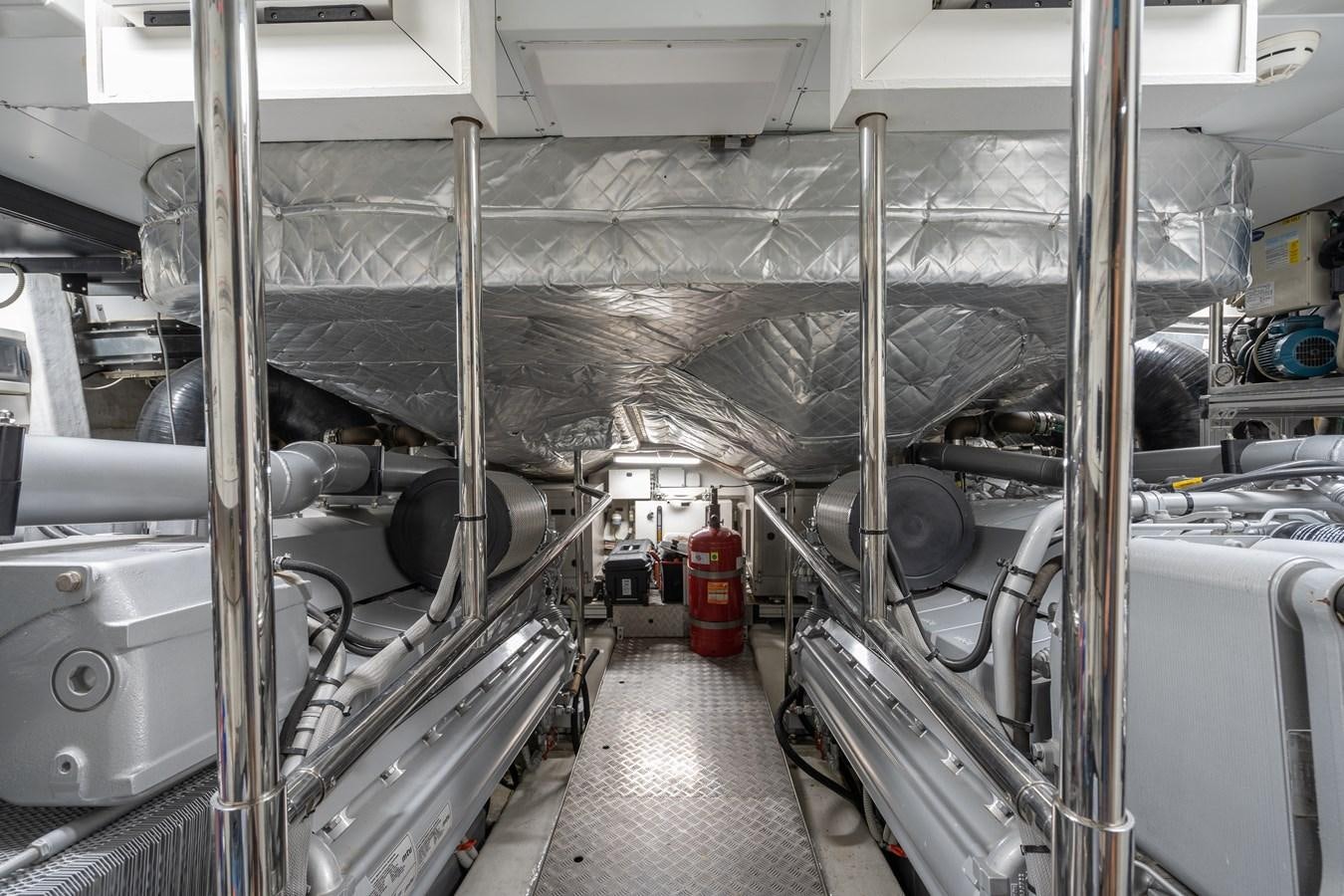 a room with pipes and equipment aboard ARENA Yacht for Sale