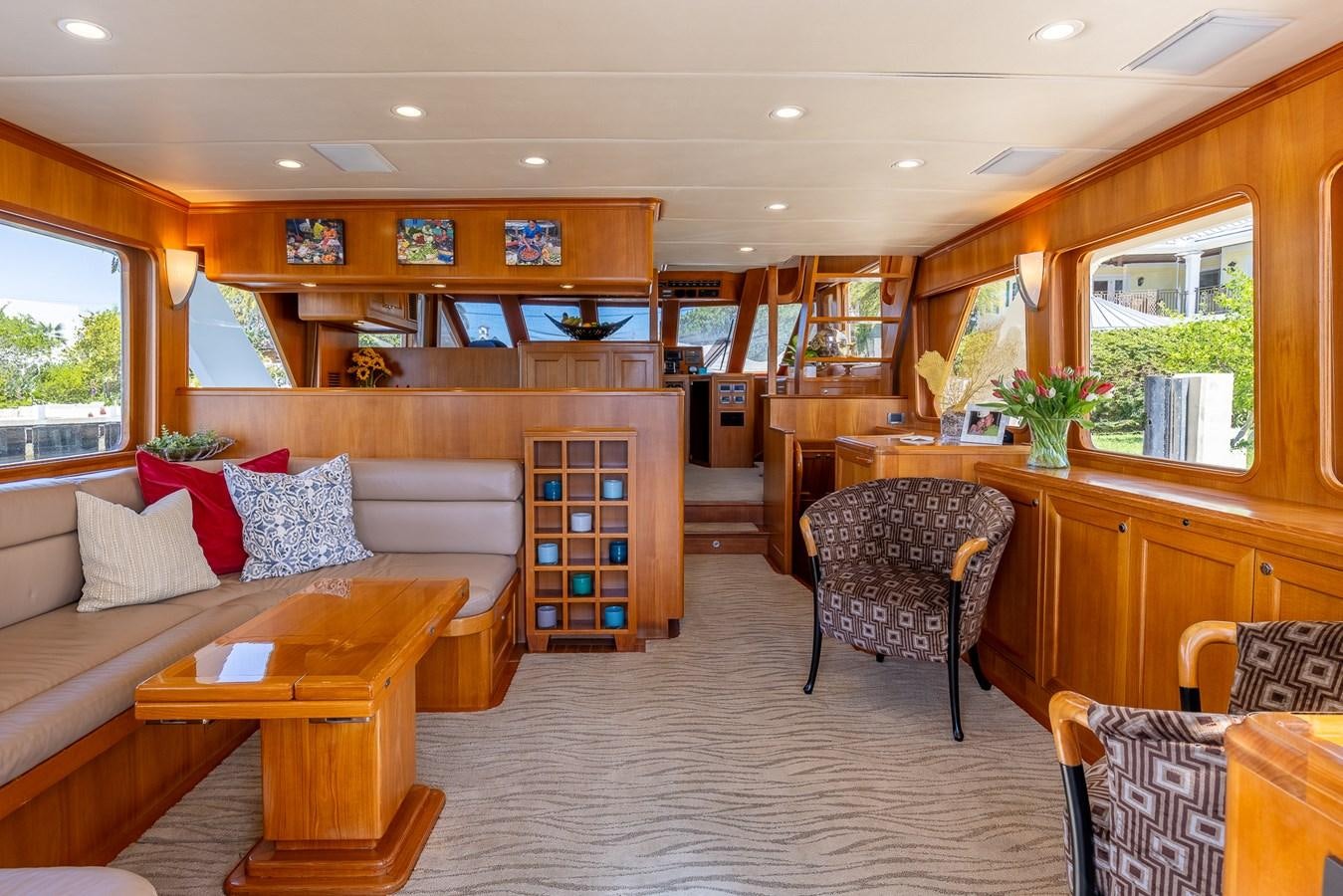 a living room with a couch and a table aboard SUNSHINE Yacht for Sale