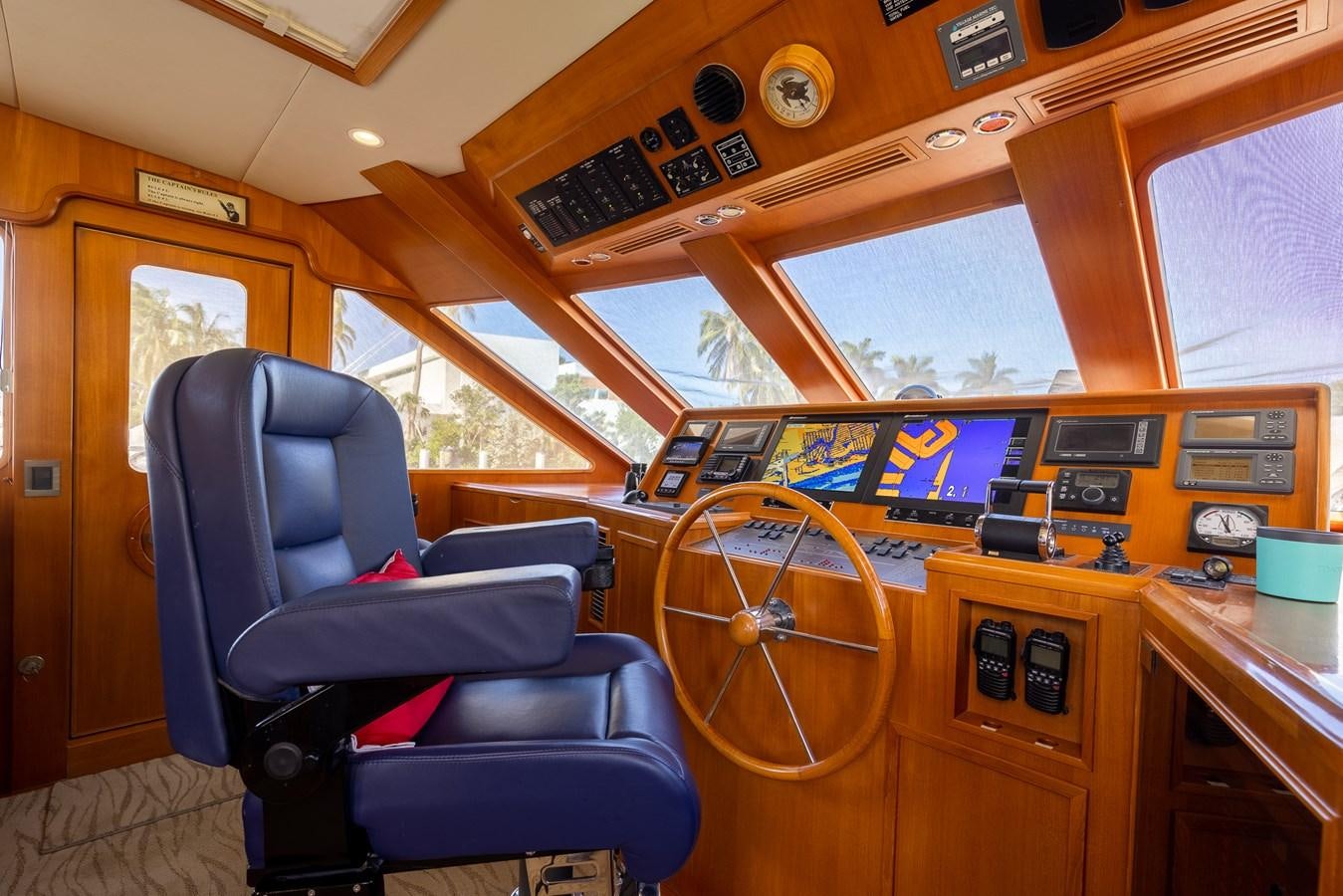 a room with a chair and a desk with a machine on it aboard SUNSHINE Yacht for Sale