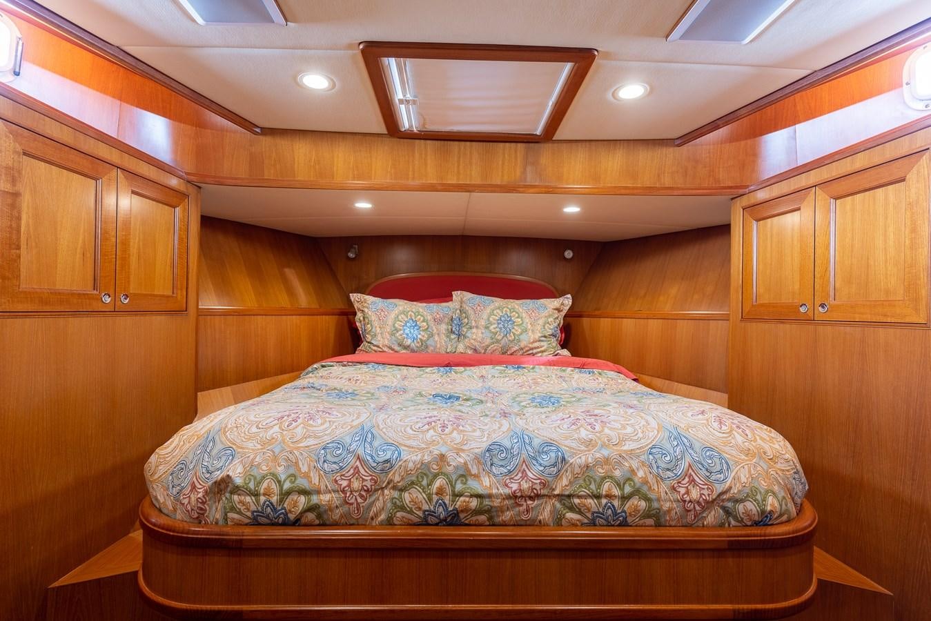 a bed in a room aboard SUNSHINE Yacht for Sale