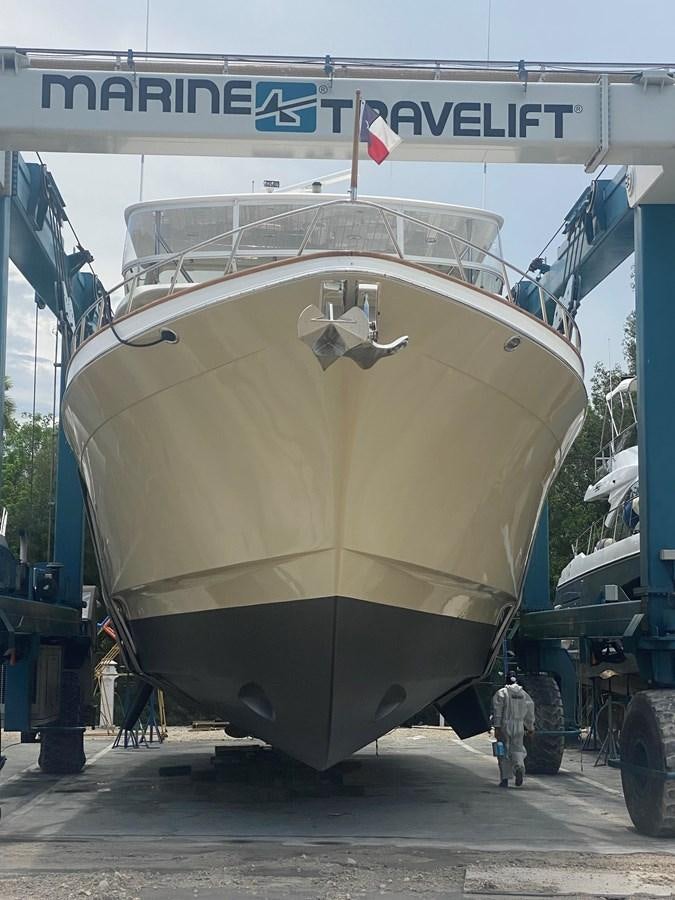 a large yellow and black airplane aboard SUNSHINE Yacht for Sale