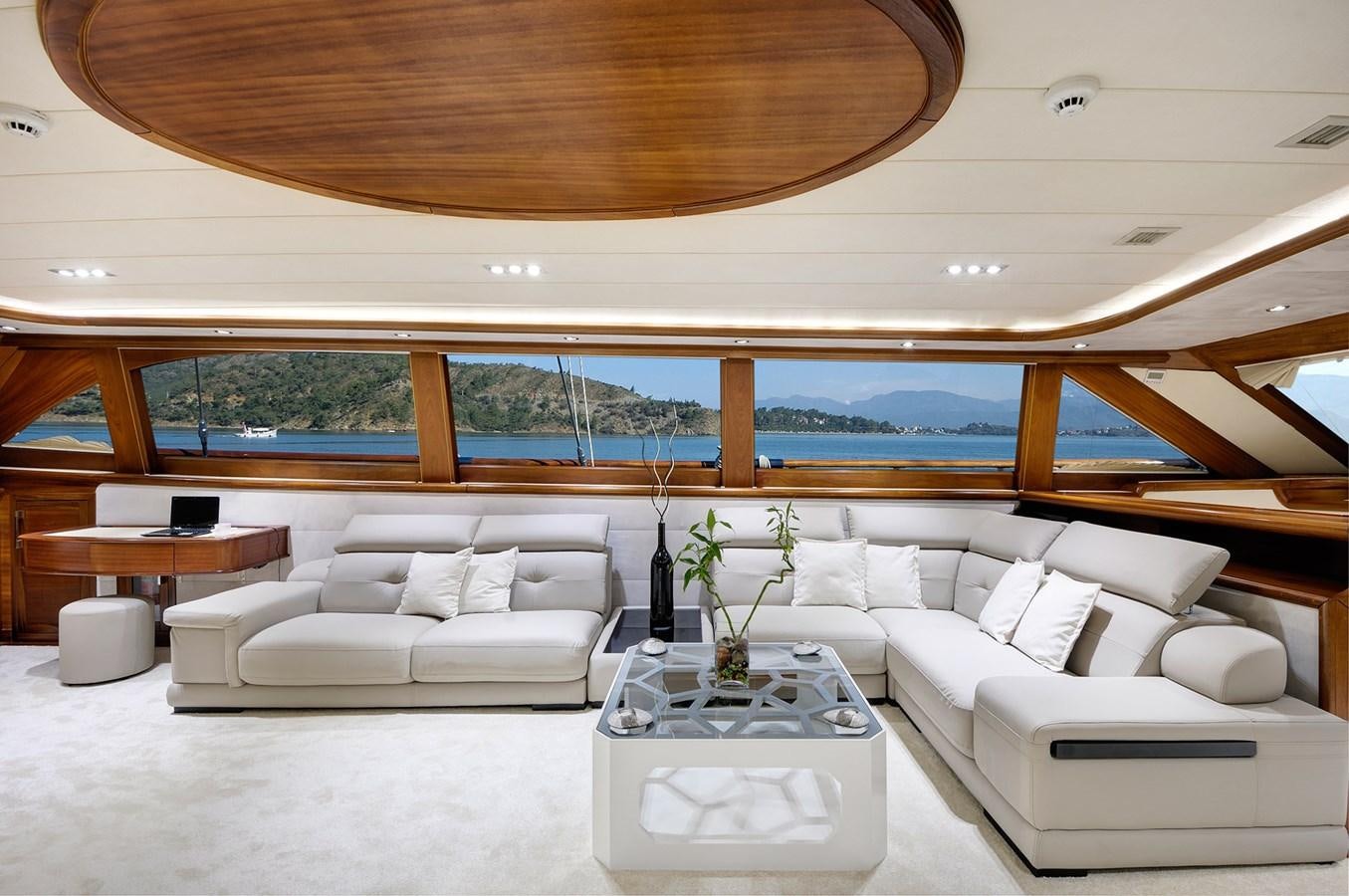 a living room with a large window aboard ALESSANDRO I Yacht for Sale