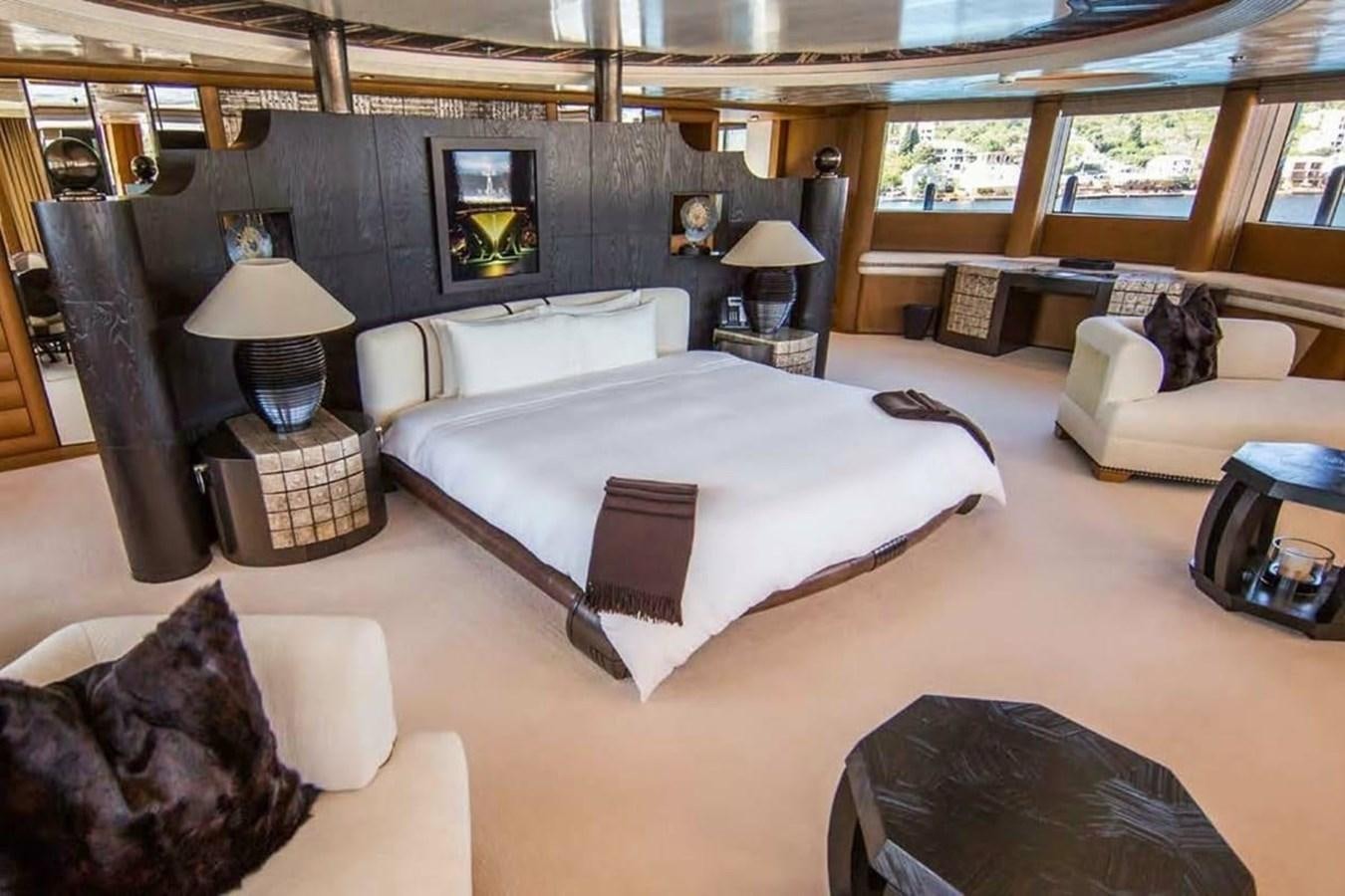 a large bedroom with a large bed aboard PELORUS Yacht for Sale