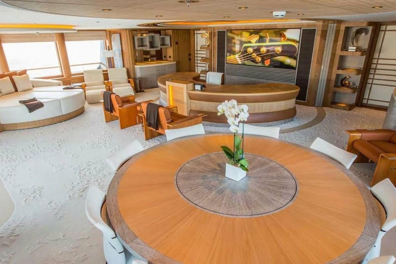 a room with a table and chairs aboard PELORUS Yacht for Sale