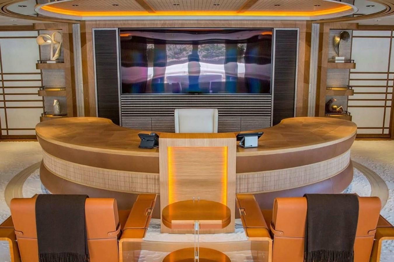 a room with a table and chairs aboard PELORUS Yacht for Sale