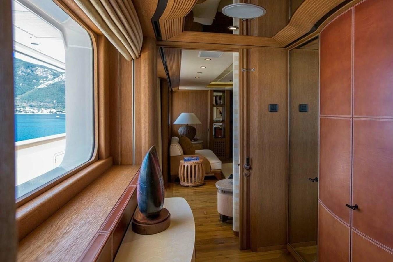 a room with a window and a view of the ocean aboard PELORUS Yacht for Sale