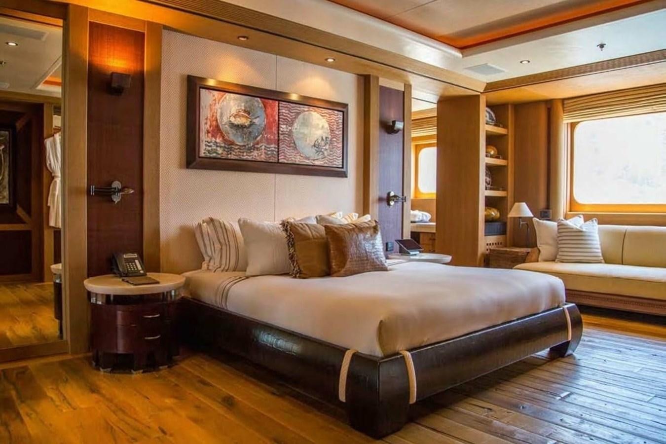 a large bed in a room aboard PELORUS Yacht for Sale