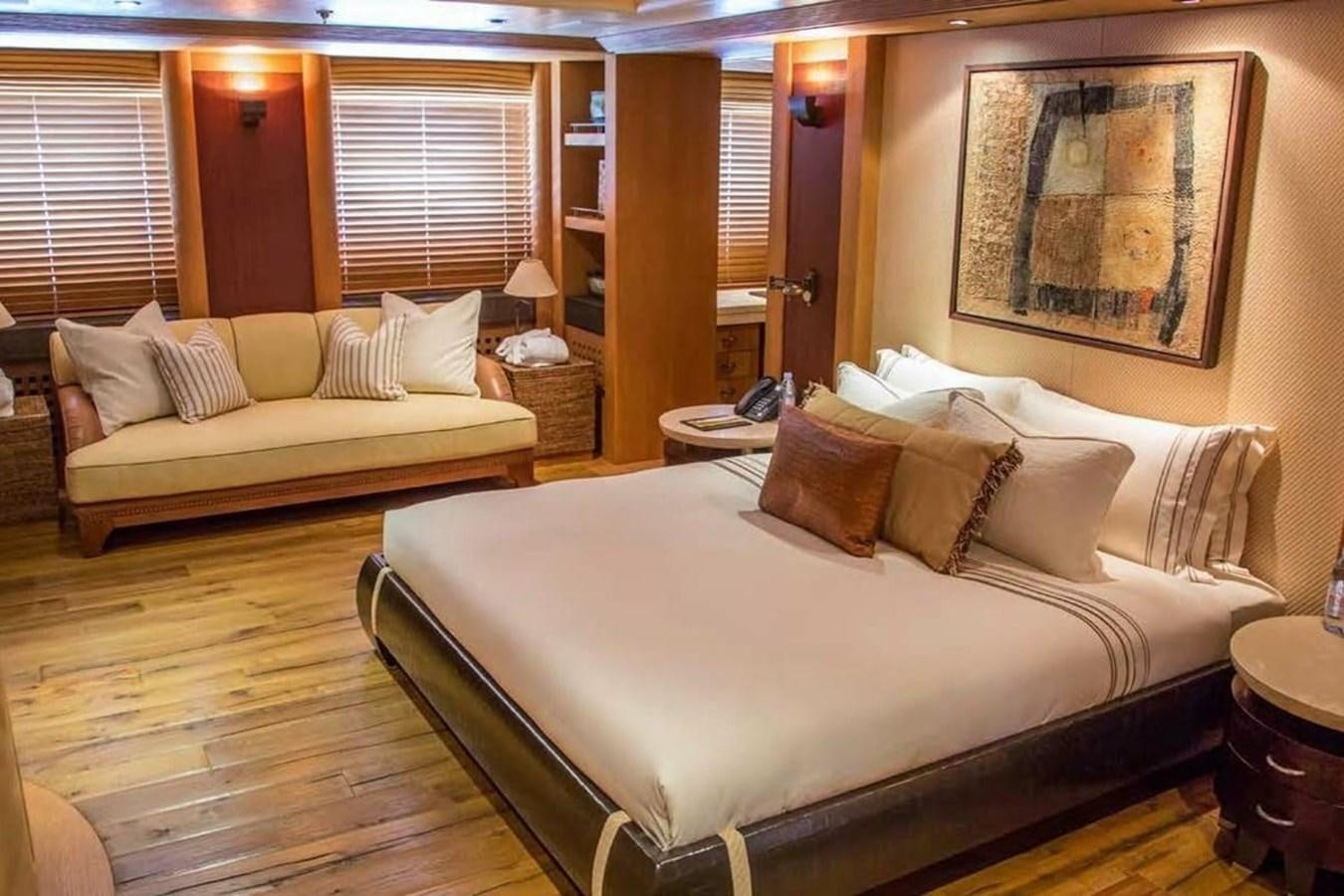 a bed in a hotel room aboard PELORUS Yacht for Sale