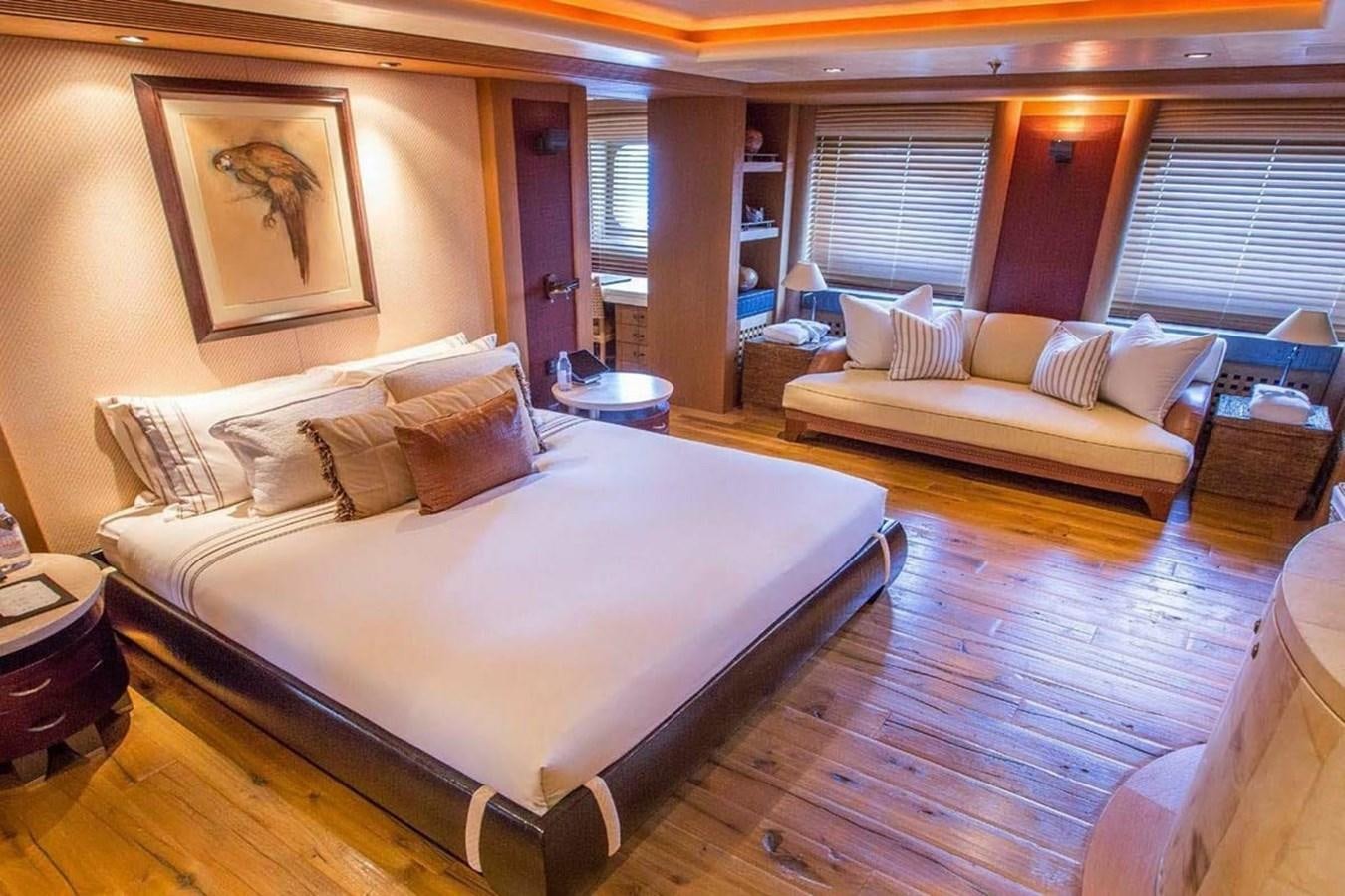 a large bed in a room aboard PELORUS Yacht for Sale