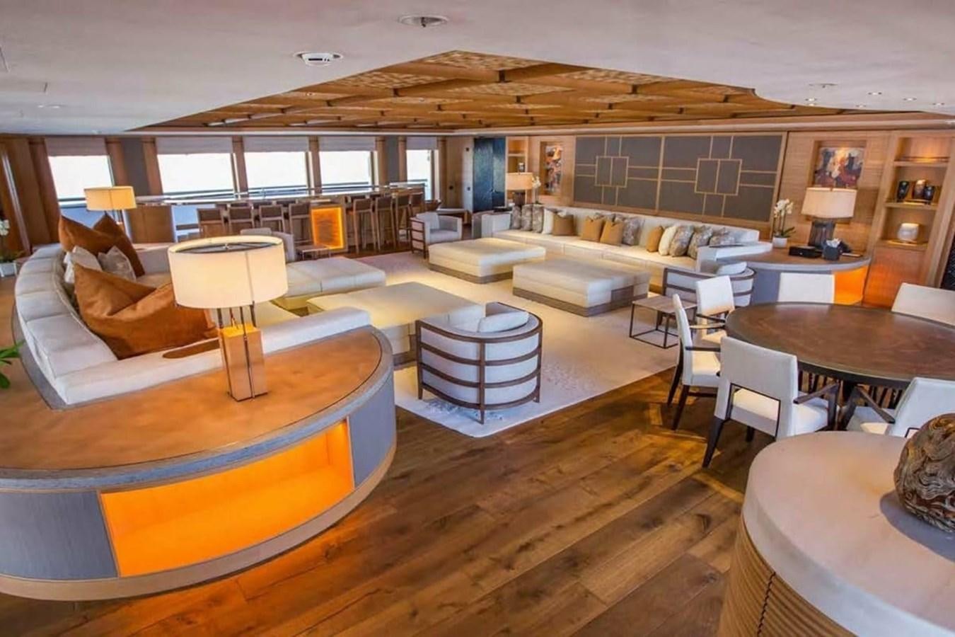 a large room with a wood floor aboard PELORUS Yacht for Sale