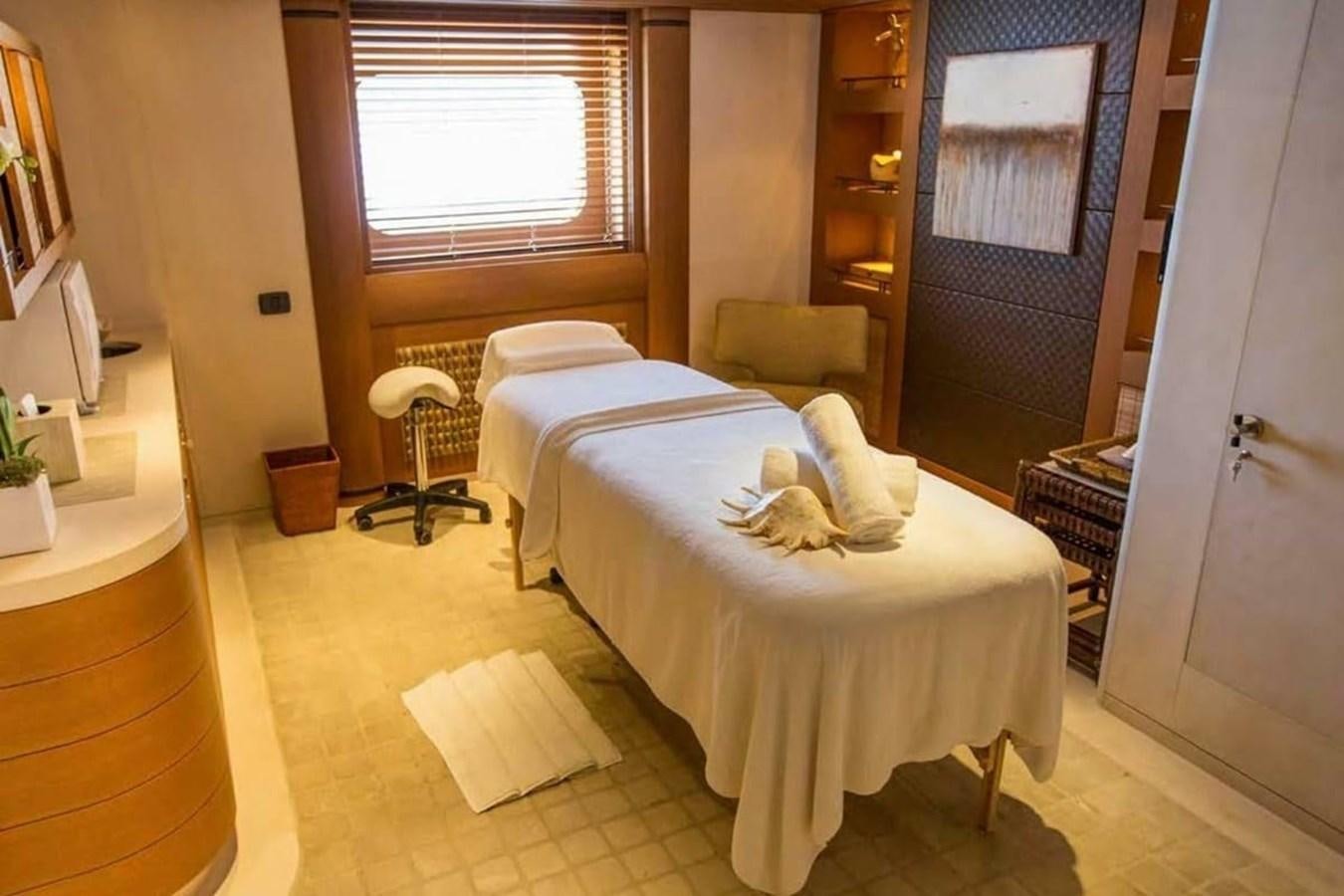 a room with a bed and a window aboard PELORUS Yacht for Sale