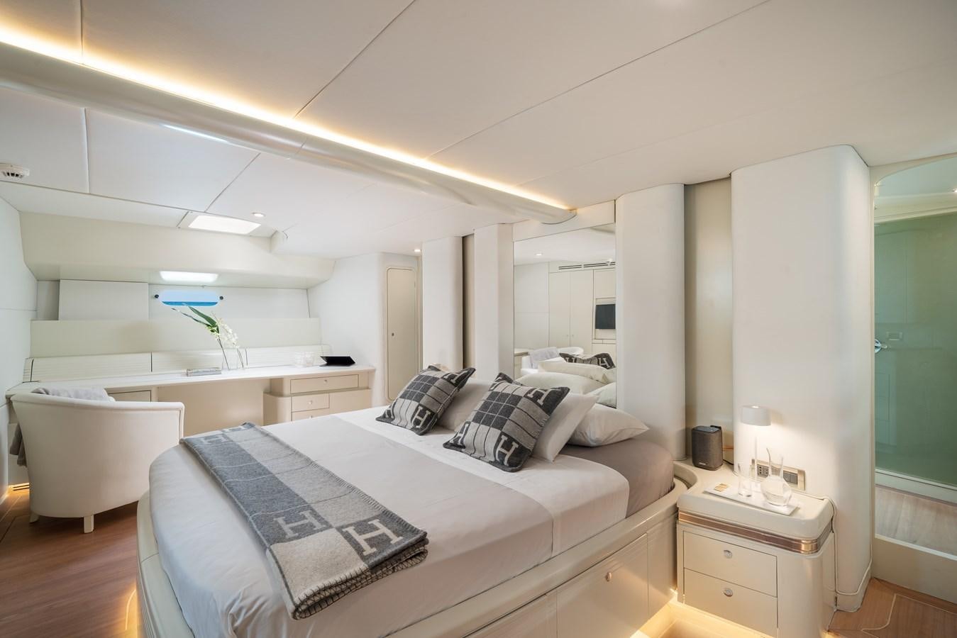 a large bedroom with a bed aboard ASHLEYROSE110 Yacht for Sale