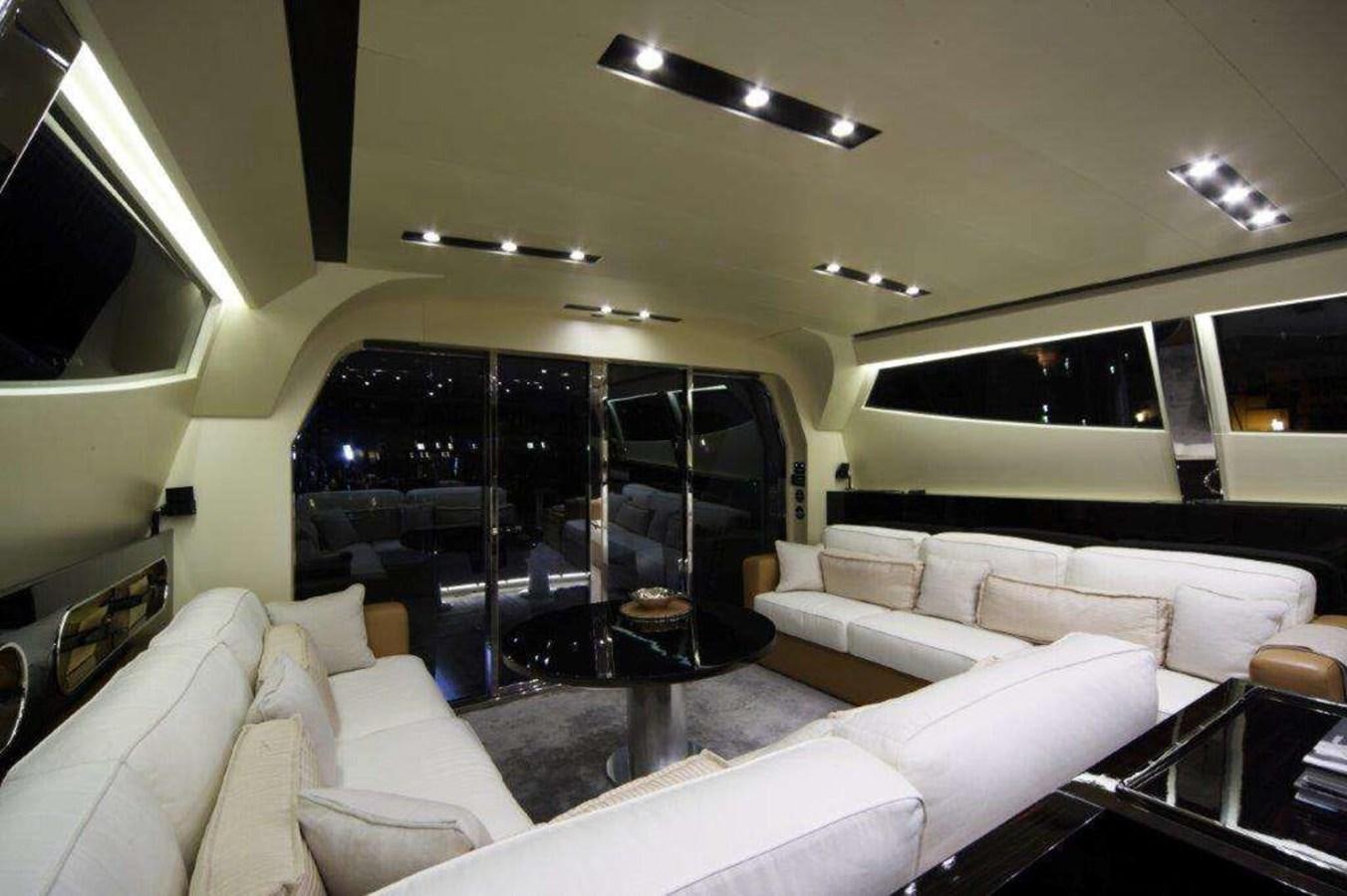 a living room with a large glass window aboard OTAM 80 Yacht for Sale