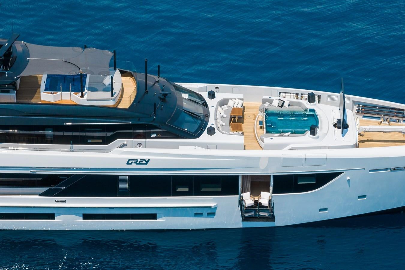 a large yacht in the water aboard JIMMY Yacht for Sale
