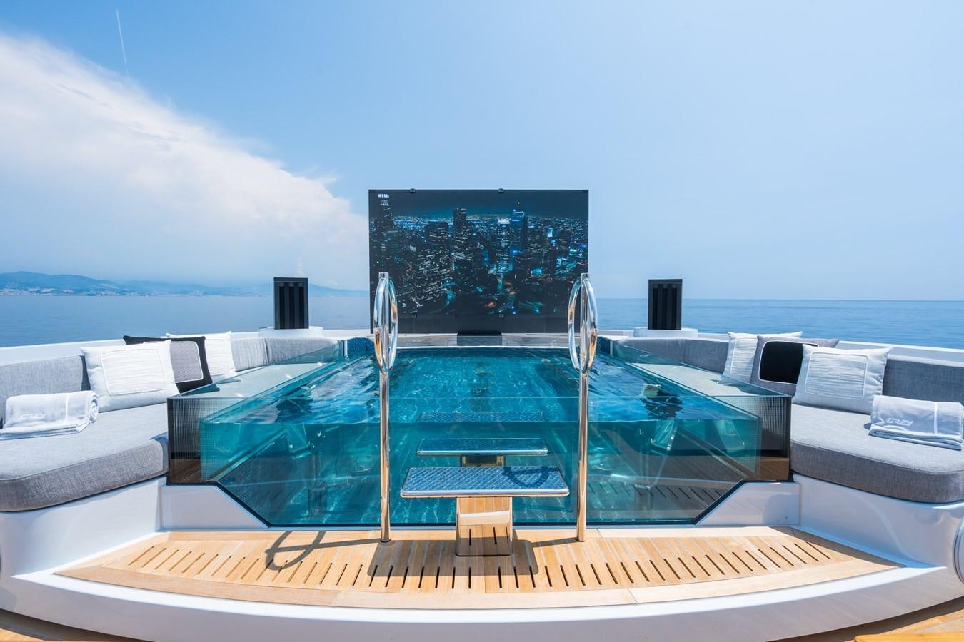 a large swimming pool aboard JIMMY Yacht for Sale