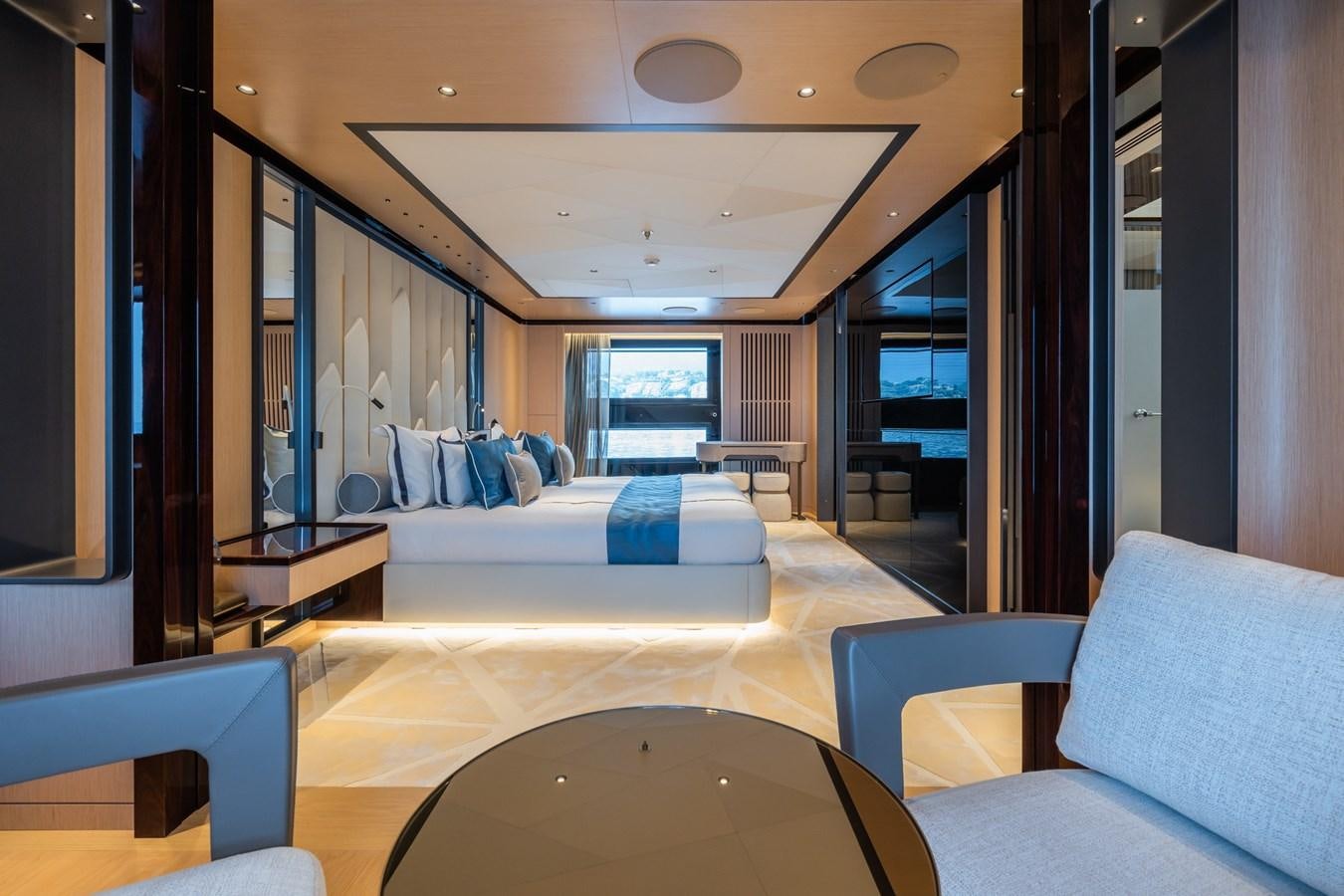 a room with a bed and a table aboard JIMMY Yacht for Sale