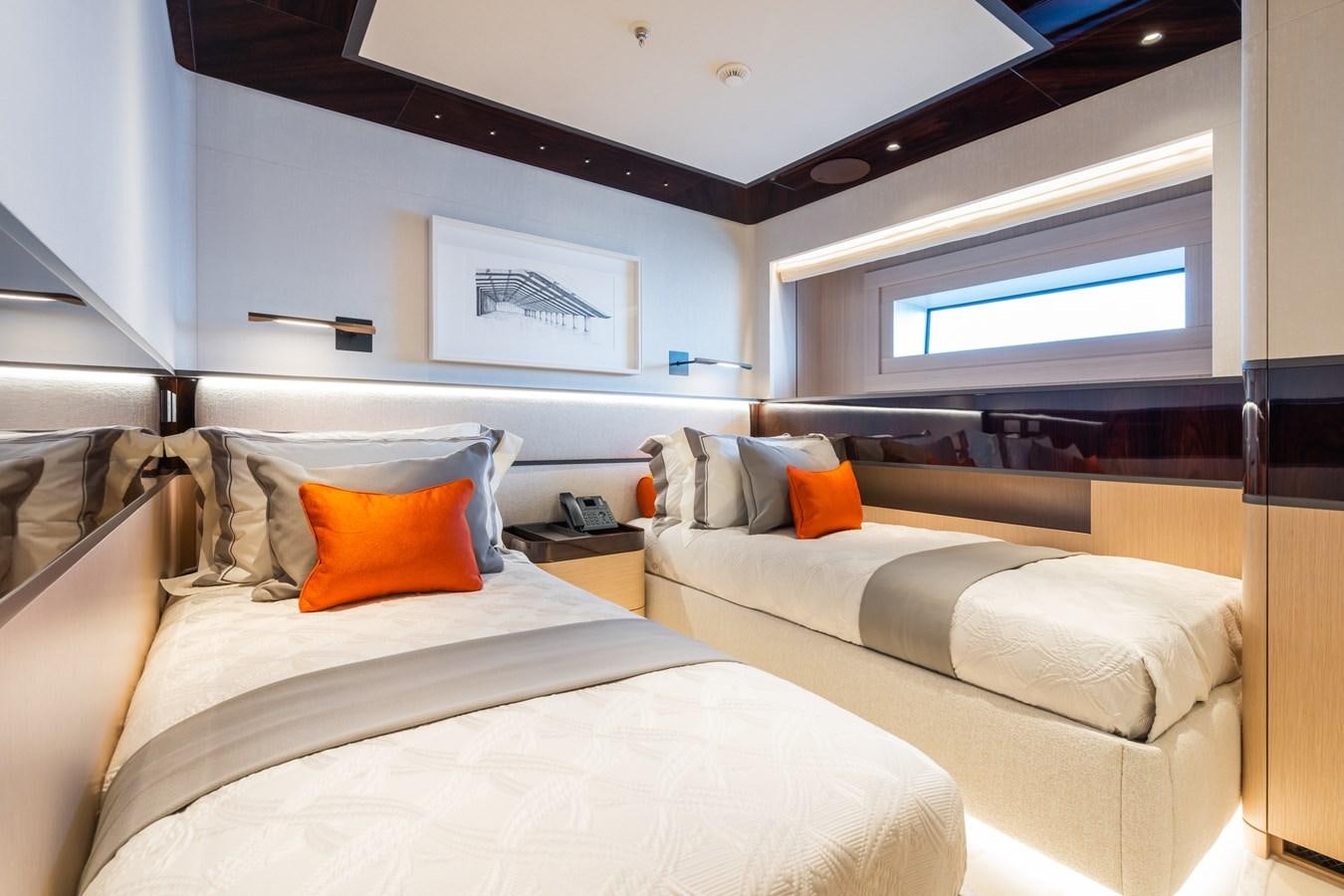 a room with two beds aboard JIMMY Yacht for Sale