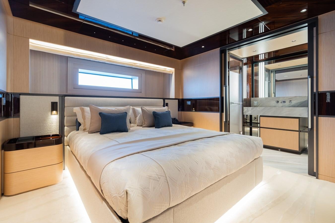 a large bed in a room aboard JIMMY Yacht for Sale