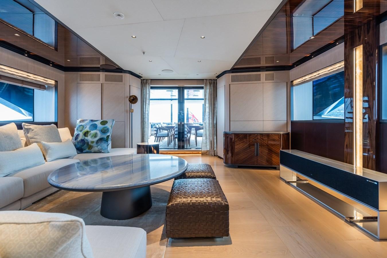 a living room with a large window aboard JIMMY Yacht for Sale