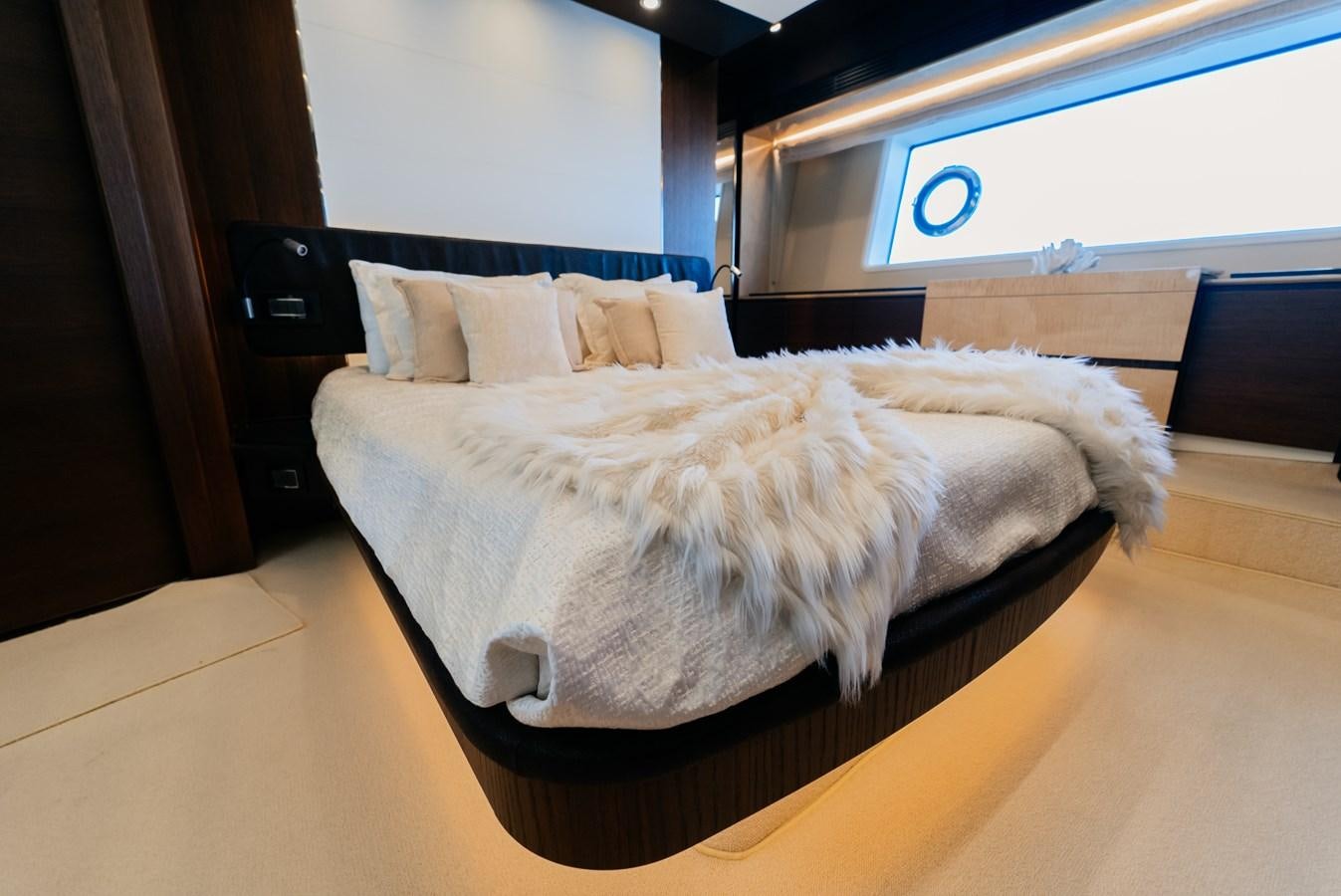a bed in a room aboard PENJA Yacht for Sale