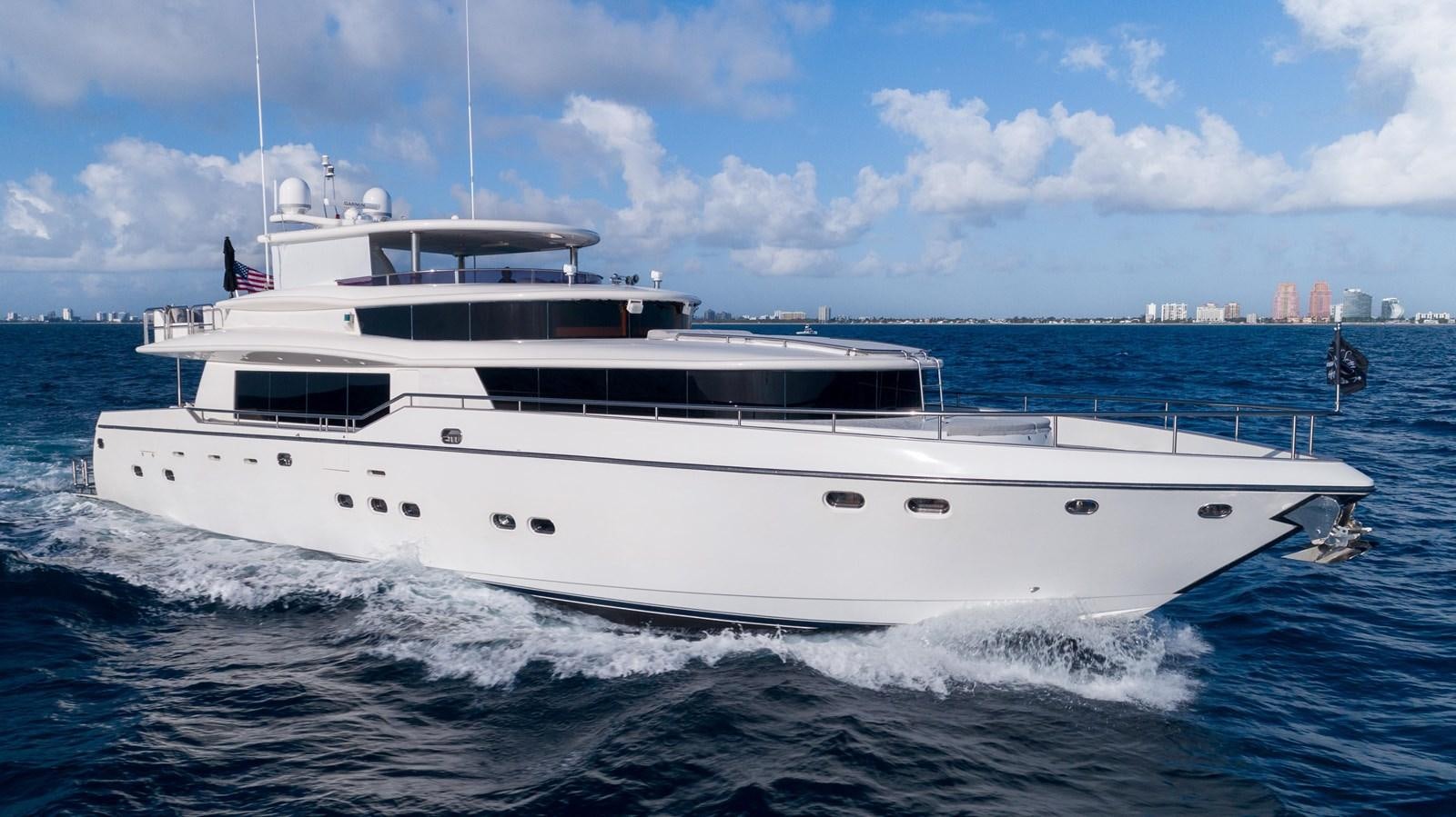 a white yacht in the water aboard NEVER SETTLE Yacht for Sale