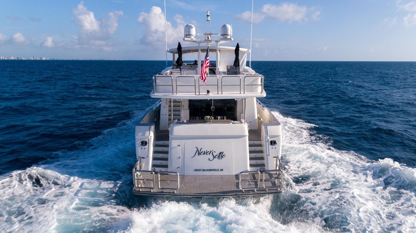 a boat in the water aboard NEVER SETTLE Yacht for Sale