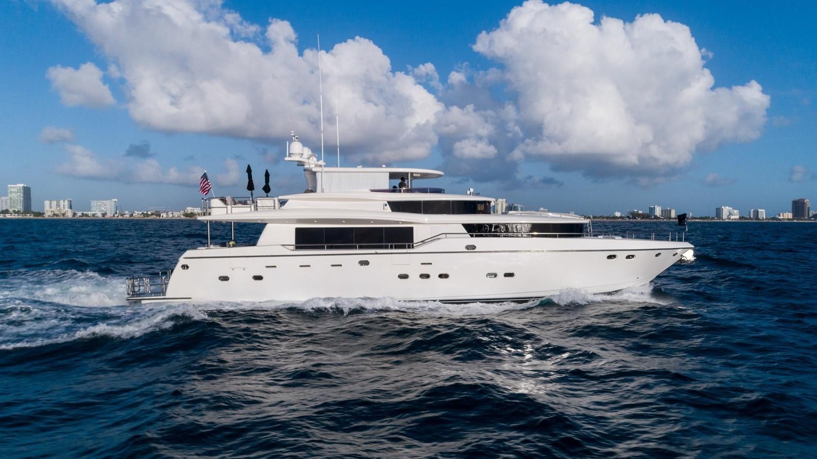 a large white boat in the water aboard NEVER SETTLE Yacht for Sale