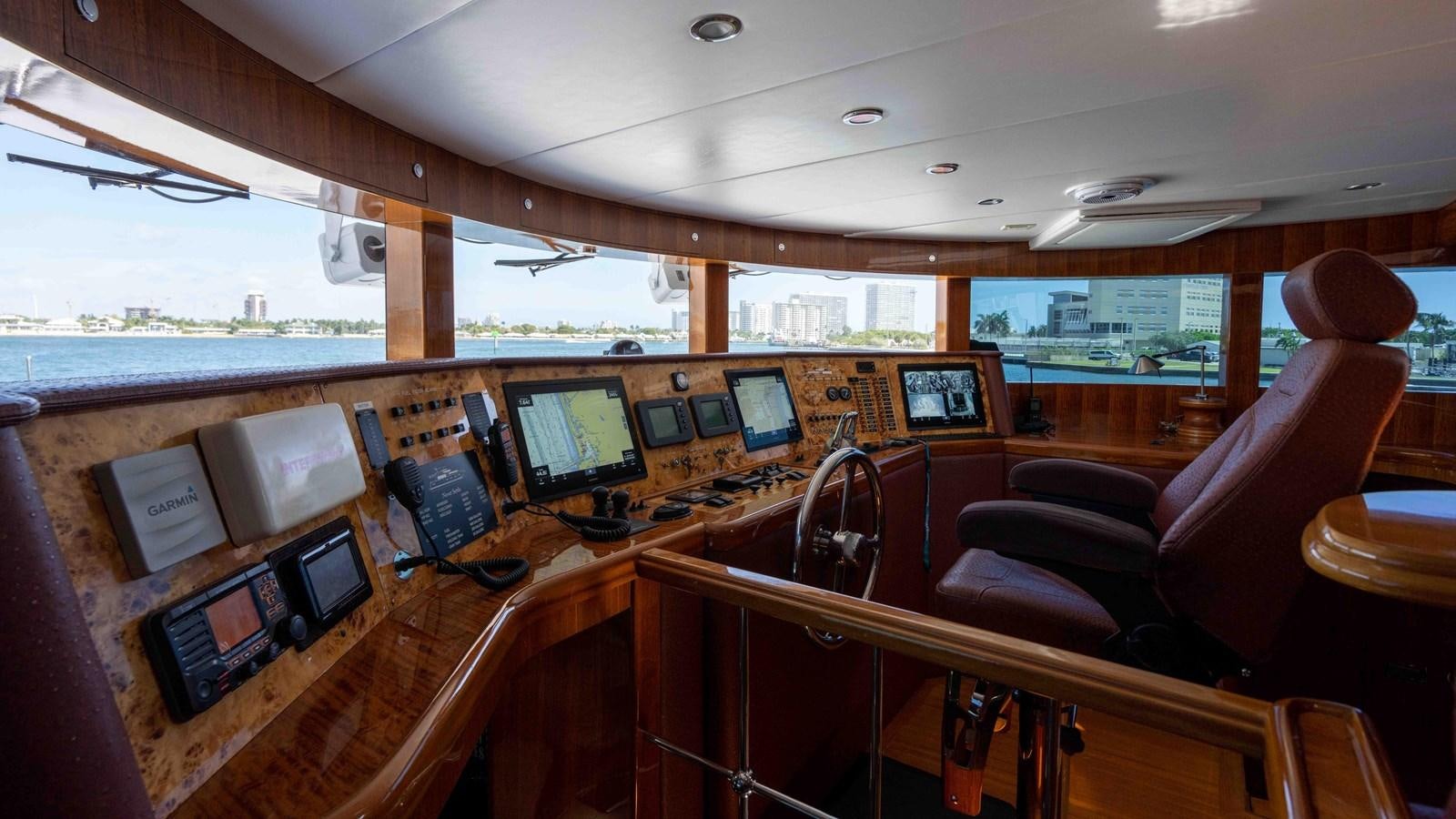 inside of a vehicle with computers aboard NEVER SETTLE Yacht for Sale