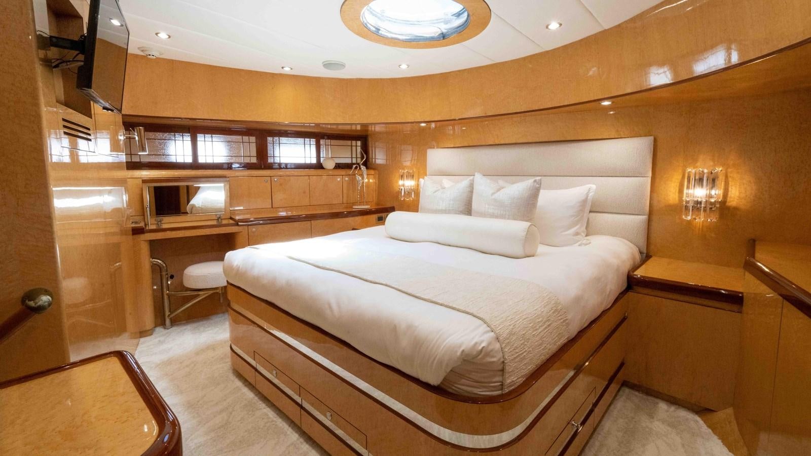 a bed in a room aboard NEVER SETTLE Yacht for Sale