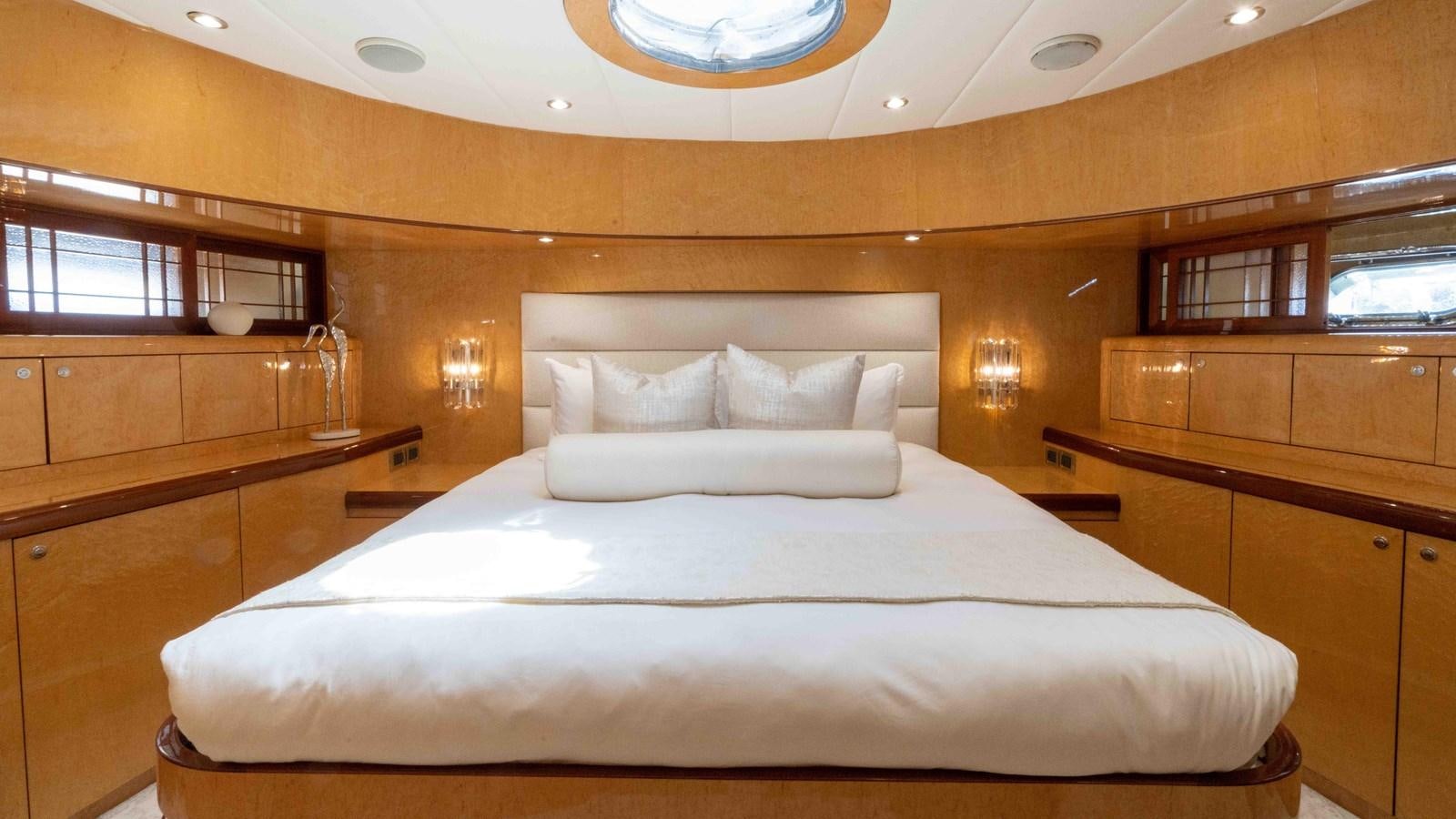 a bed in a room aboard NEVER SETTLE Yacht for Sale